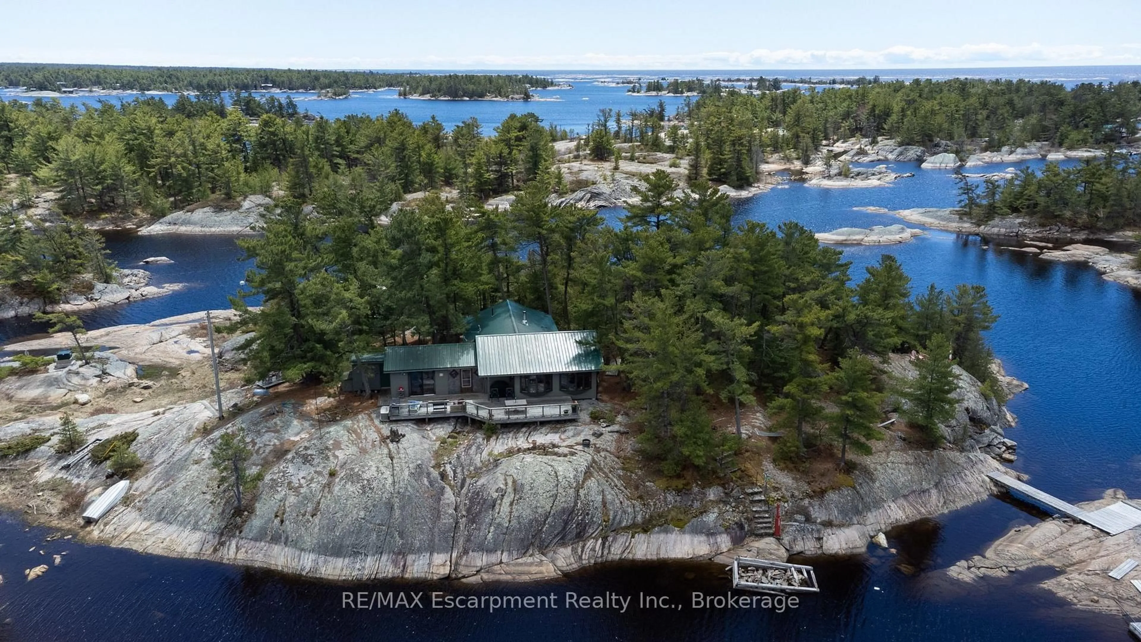 A pic from outside/outdoor area/front of a property/back of a property/a pic from drone, water/lake/river/ocean view for 1 A764 Island Island, The Archipelago Ontario P0G 1K0