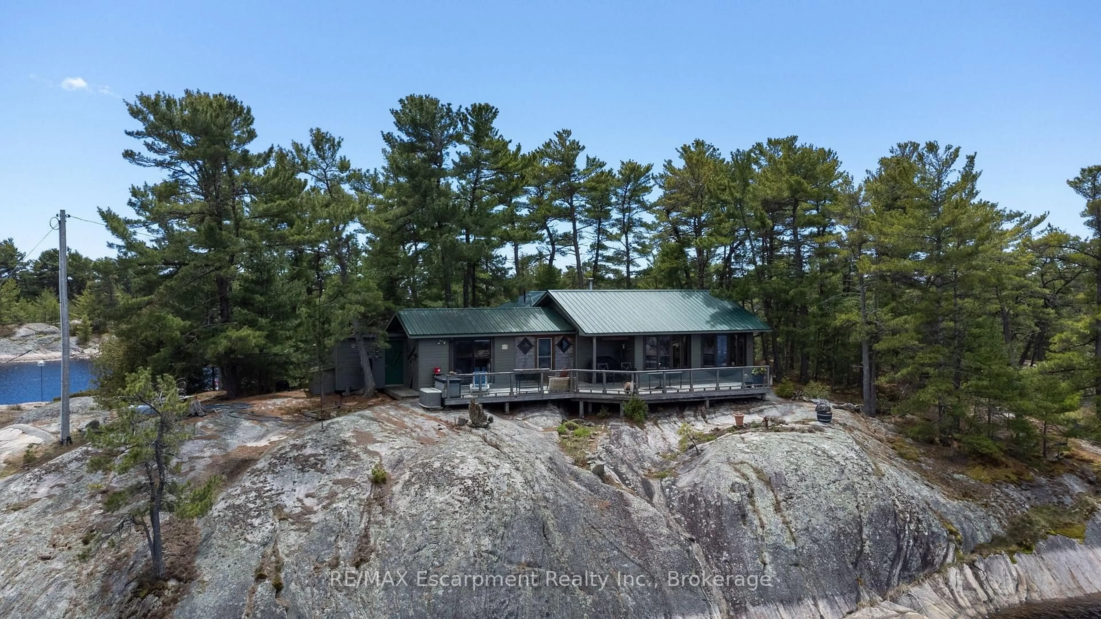 A pic from outside/outdoor area/front of a property/back of a property/a pic from drone, water/lake/river/ocean view for 1 A764 Island Island, The Archipelago Ontario P0G 1K0