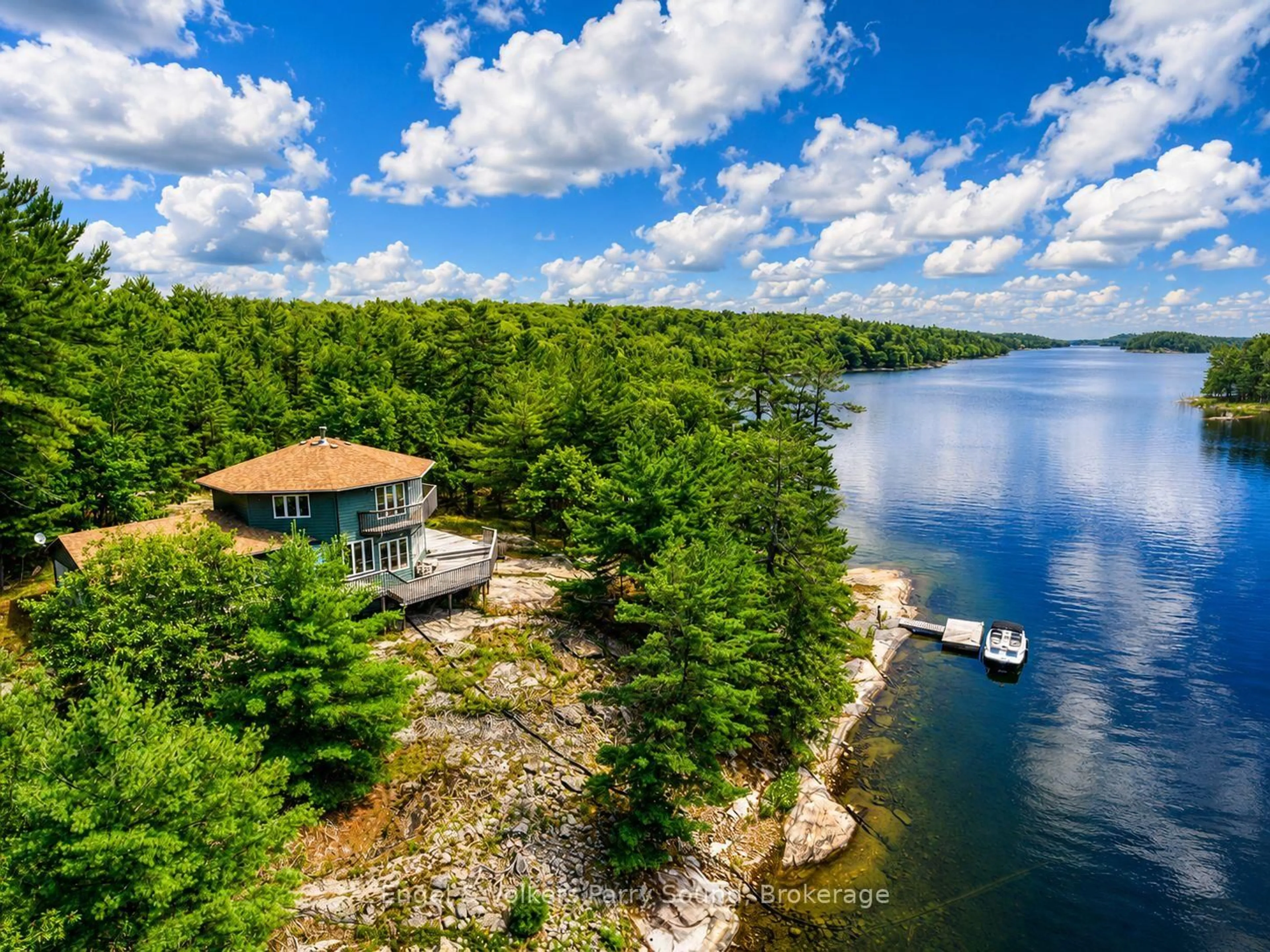A pic from outside/outdoor area/front of a property/back of a property/a pic from drone, water/lake/river/ocean view for 1 Loon Bay, Carling Ontario P0G 1G0