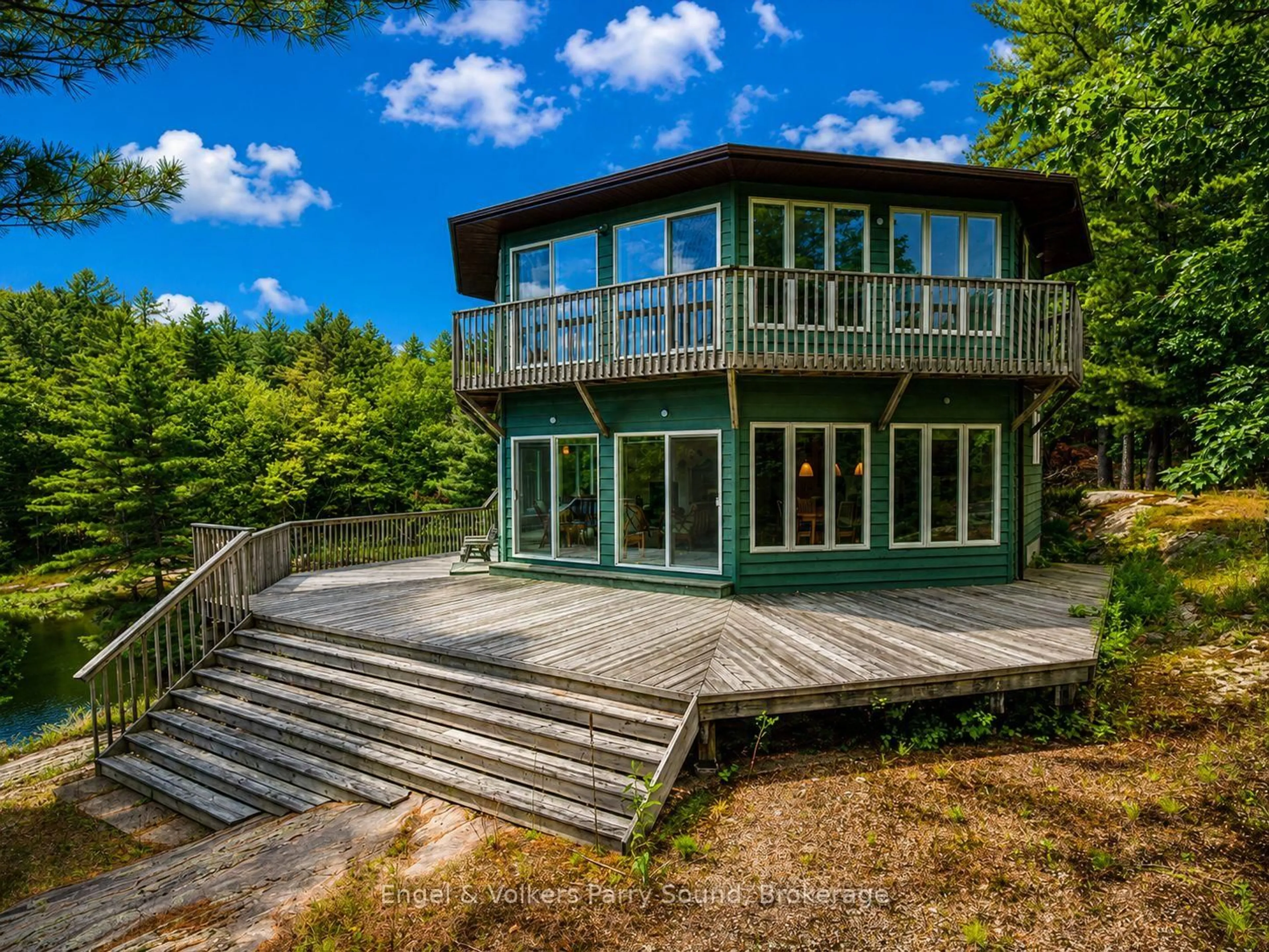 A pic from outside/outdoor area/front of a property/back of a property/a pic from drone, water/lake/river/ocean view for 1 Loon Bay, Carling Ontario P0G 1G0