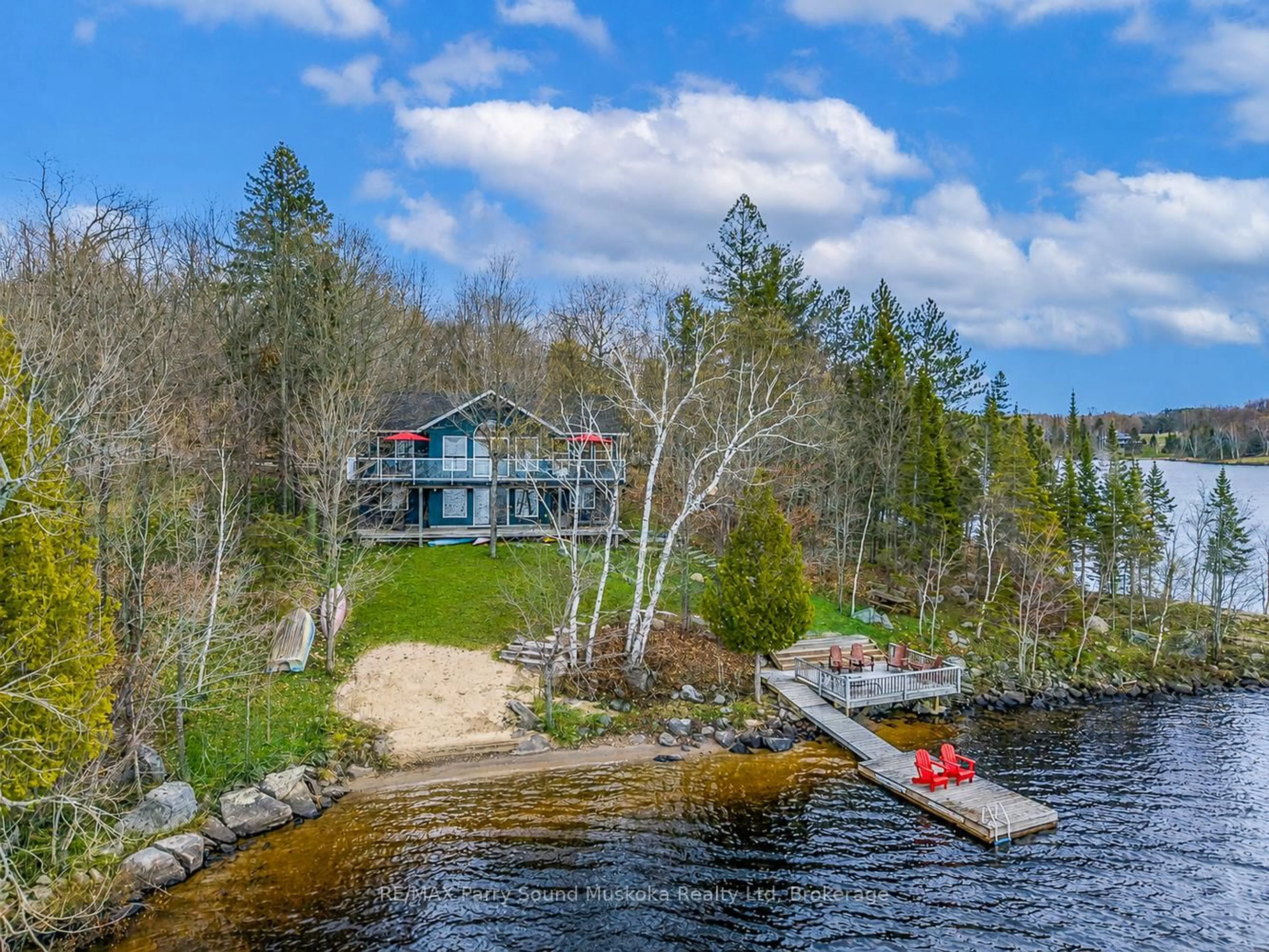 A pic from outside/outdoor area/front of a property/back of a property/a pic from drone, water/lake/river/ocean view for 54 Dauncey Rd, Magnetawan Ontario P0A 1P0