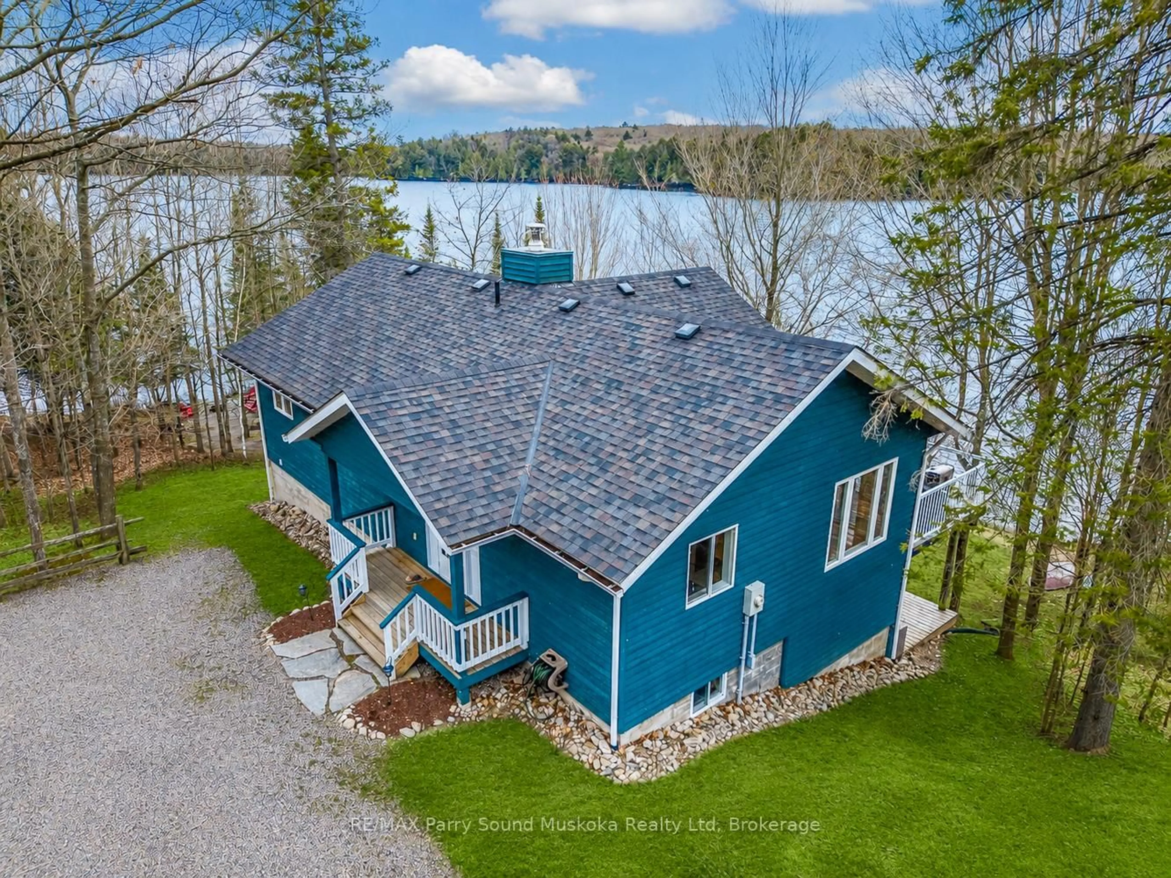 A pic from outside/outdoor area/front of a property/back of a property/a pic from drone, water/lake/river/ocean view for 54 Dauncey Rd, Magnetawan Ontario P0A 1P0