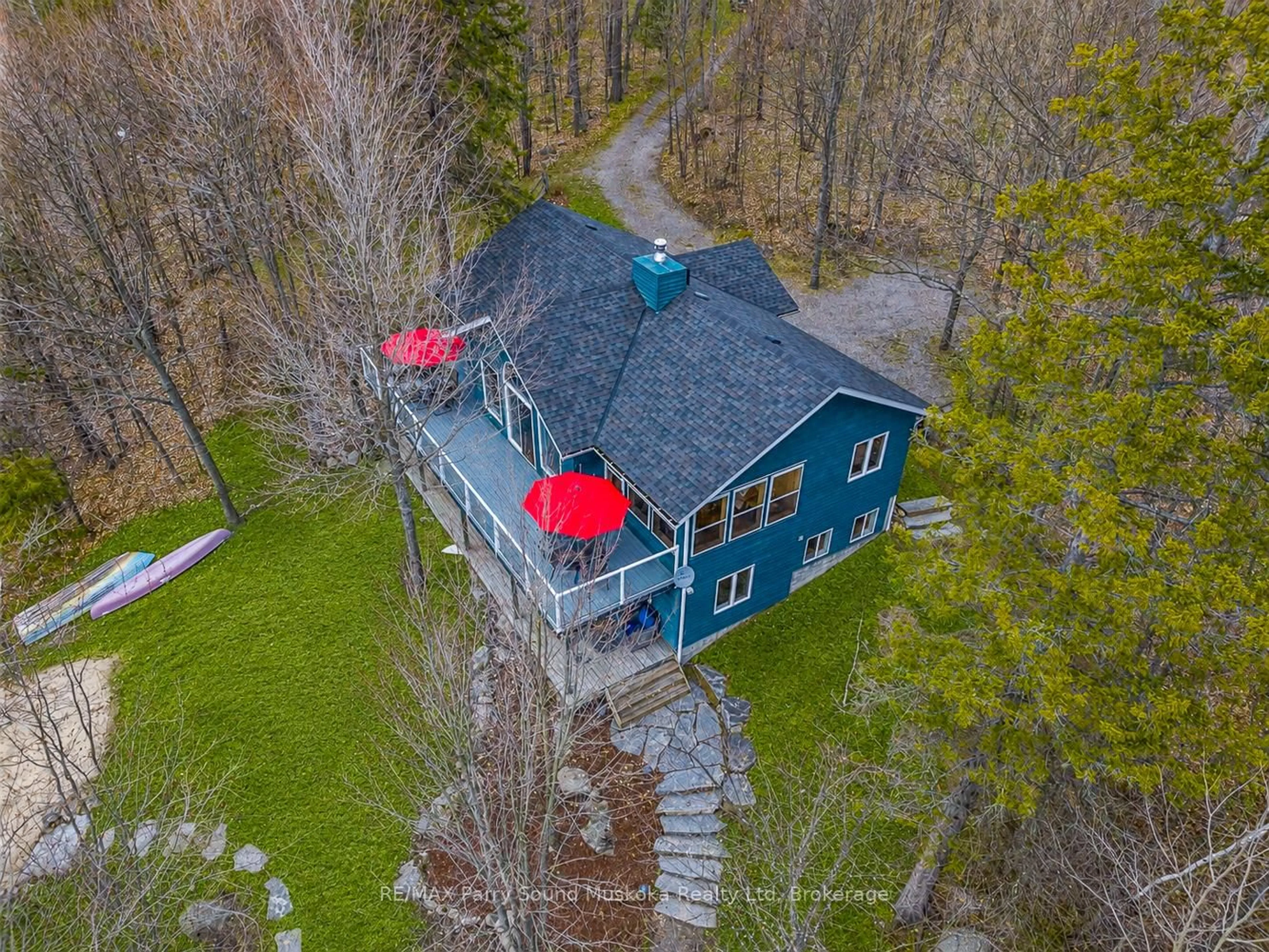 A pic from outside/outdoor area/front of a property/back of a property/a pic from drone, unknown for 54 Dauncey Rd, Magnetawan Ontario P0A 1P0