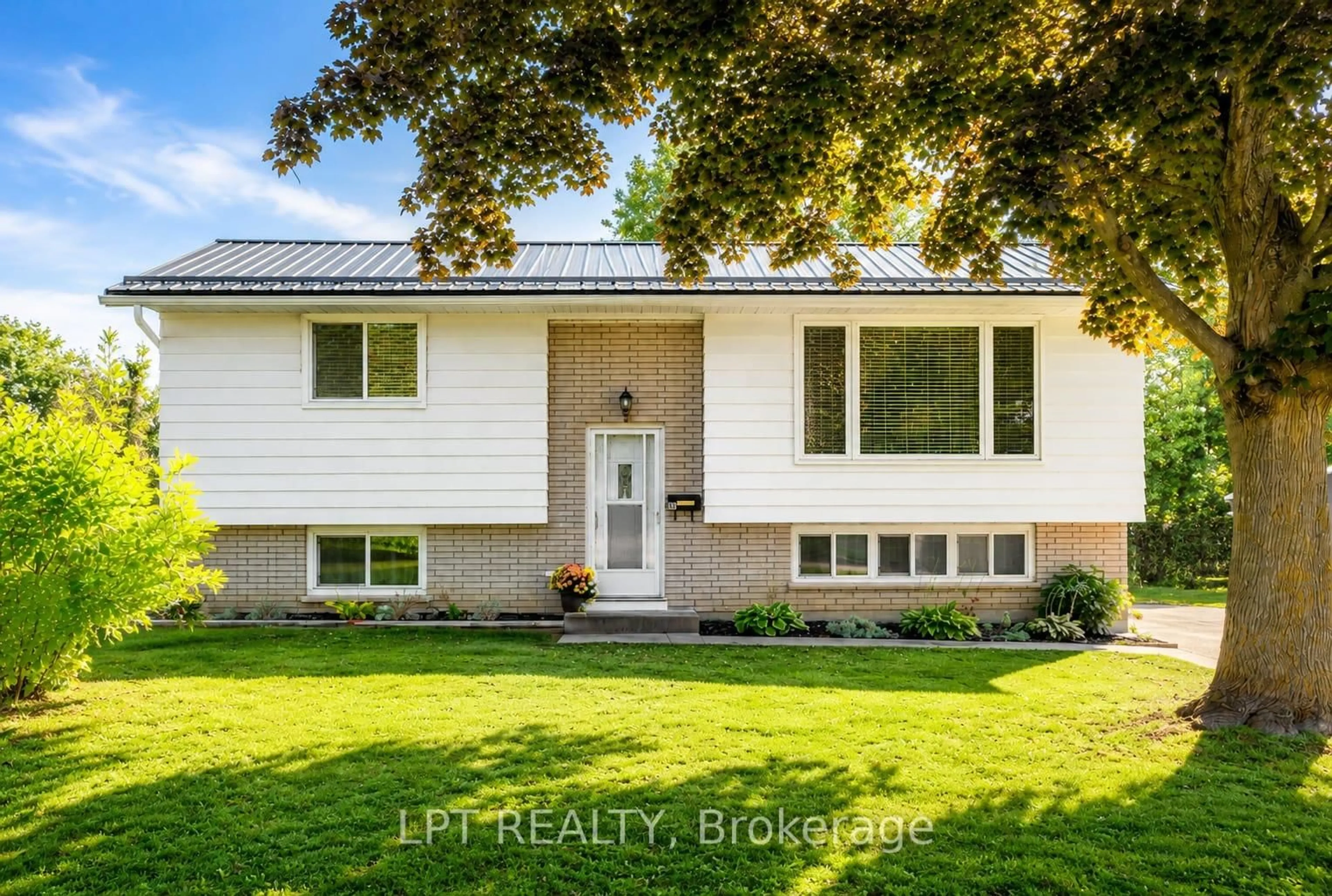 Home with vinyl exterior material, street for 56 ST. PATRICK St, Kawartha Lakes Ontario K9V 1R5