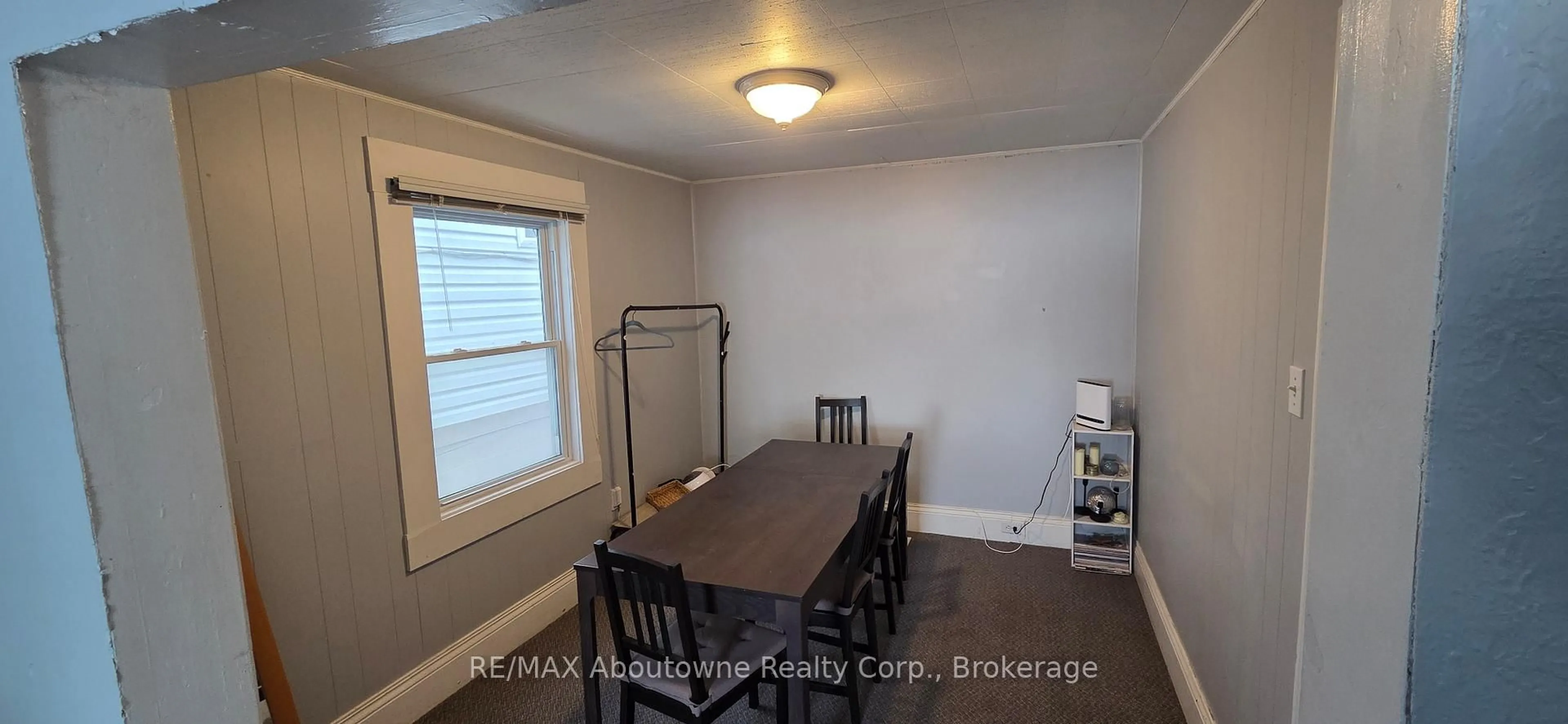 Dining room, wood/laminate floor for 157 Ward Ave, Hamilton Ontario L8S 2G1
