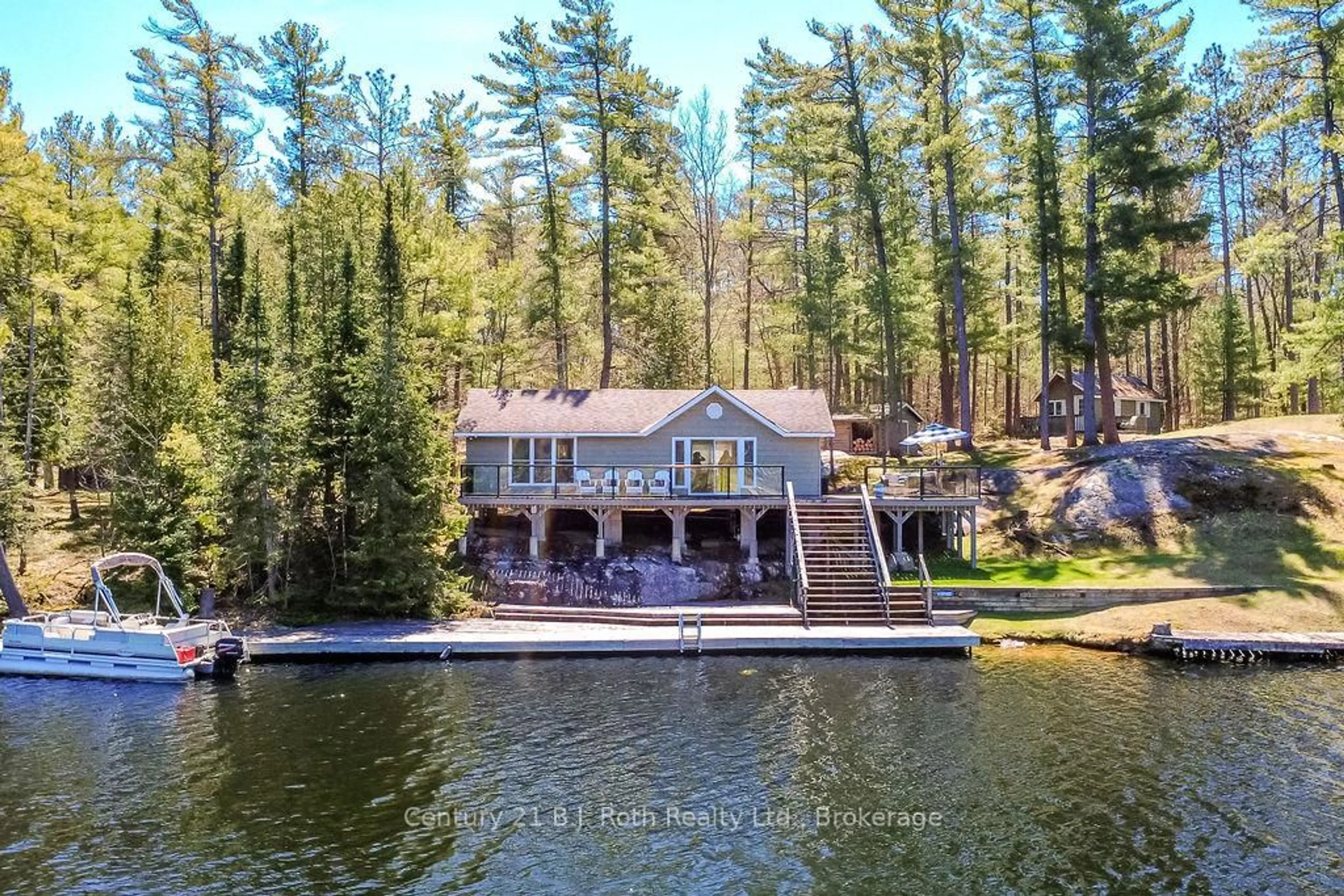 A pic from outside/outdoor area/front of a property/back of a property/a pic from drone, water/lake/river/ocean view for 9 Severn River 403, Muskoka Lakes Ontario P0C 1M0