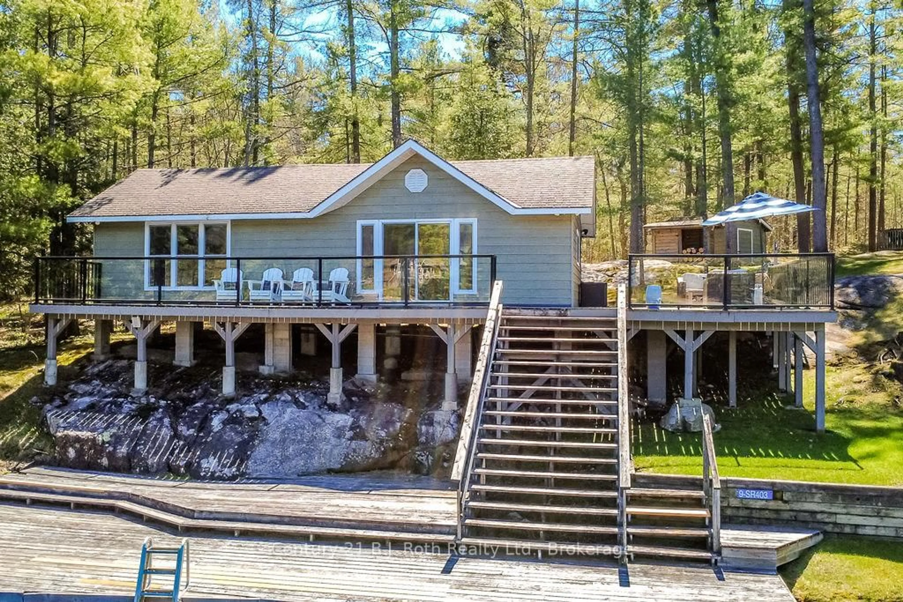 A pic from outside/outdoor area/front of a property/back of a property/a pic from drone, water/lake/river/ocean view for 9 Severn River 403, Muskoka Lakes Ontario P0C 1M0