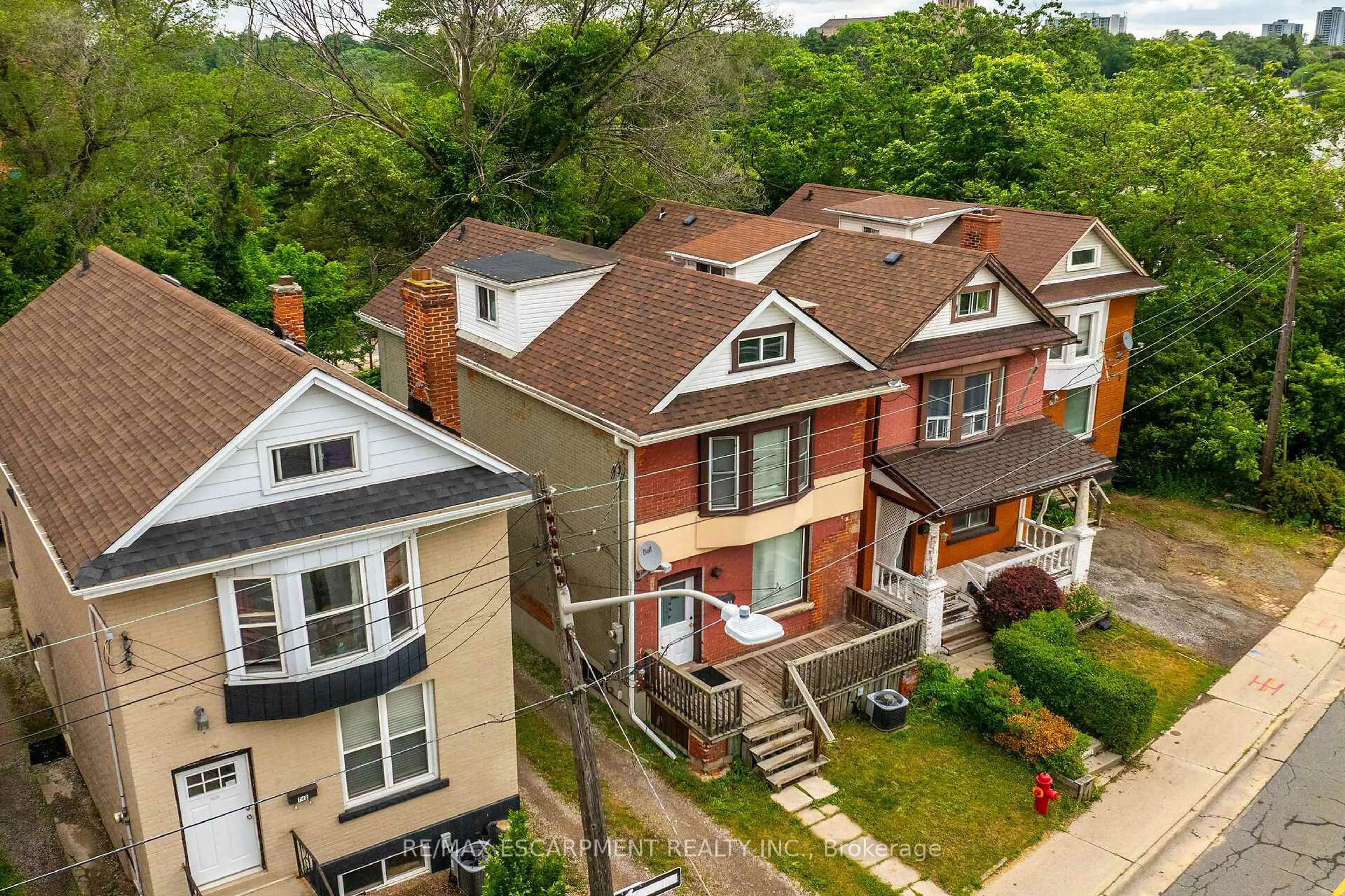 A pic from outside/outdoor area/front of a property/back of a property/a pic from drone, street for 738 KING St, Hamilton Ontario L8S 1J8
