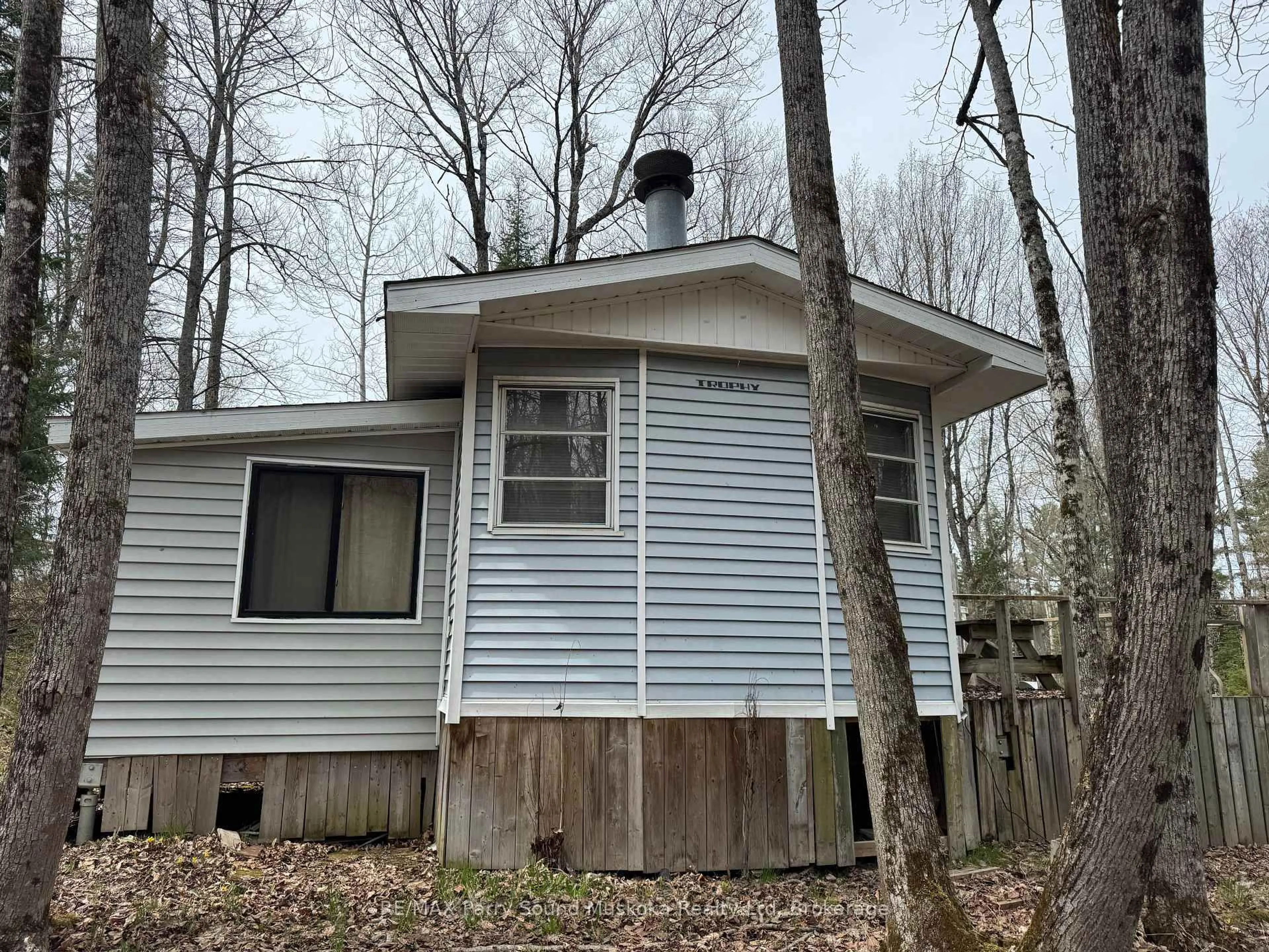 Home with vinyl exterior material, forest/trees view for 34 Weber Rd, Parry Sound Remote Area Ontario P0H 1S0