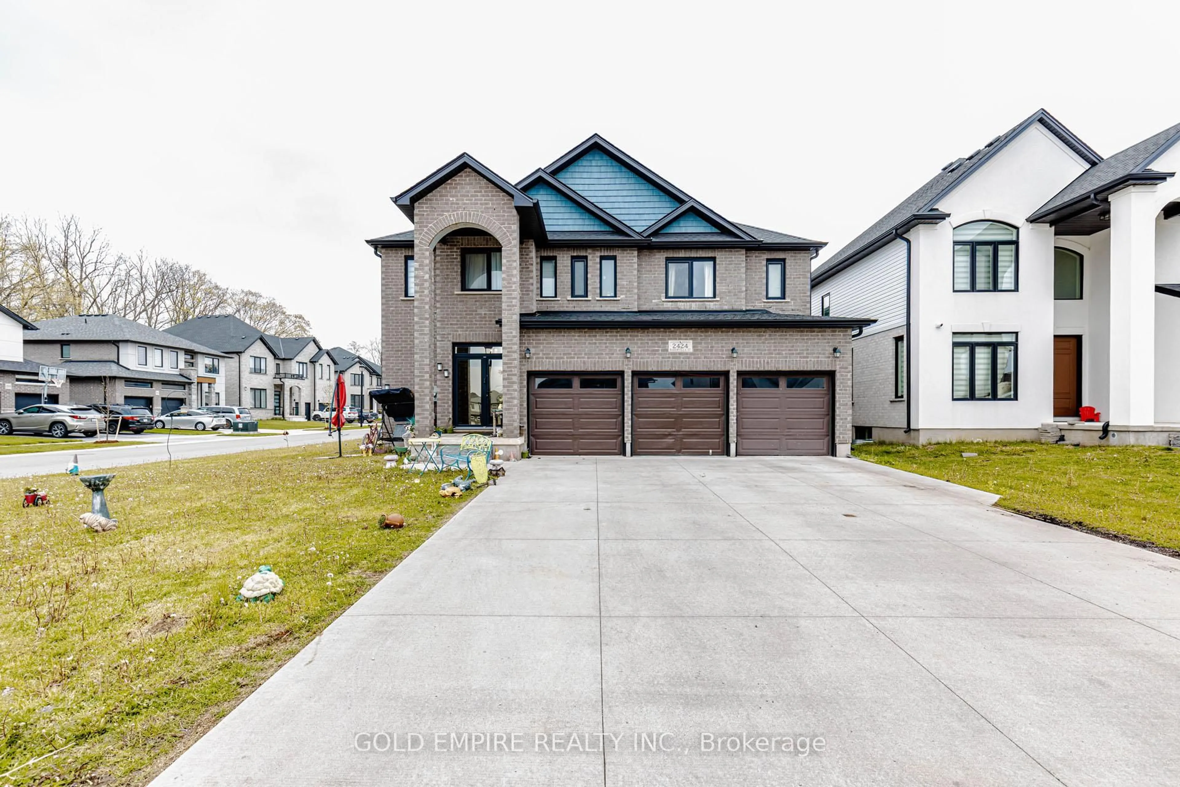 Home with brick exterior material, street for 2424 BAKERVILLA St, London South Ontario N6P 0E7