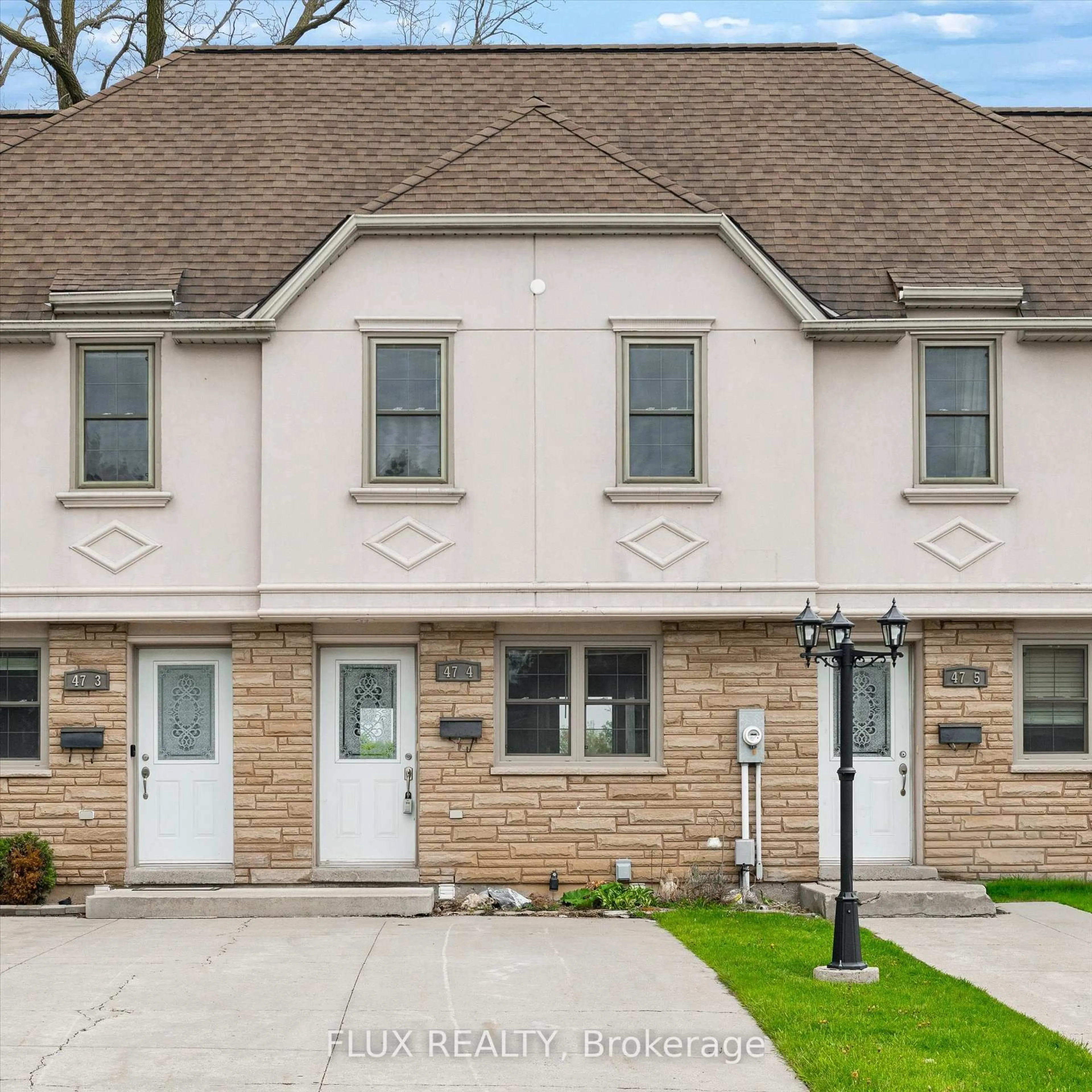 Home with vinyl exterior material, street for 47 Blandford St #4, Woodstock Ontario N4S 7H7