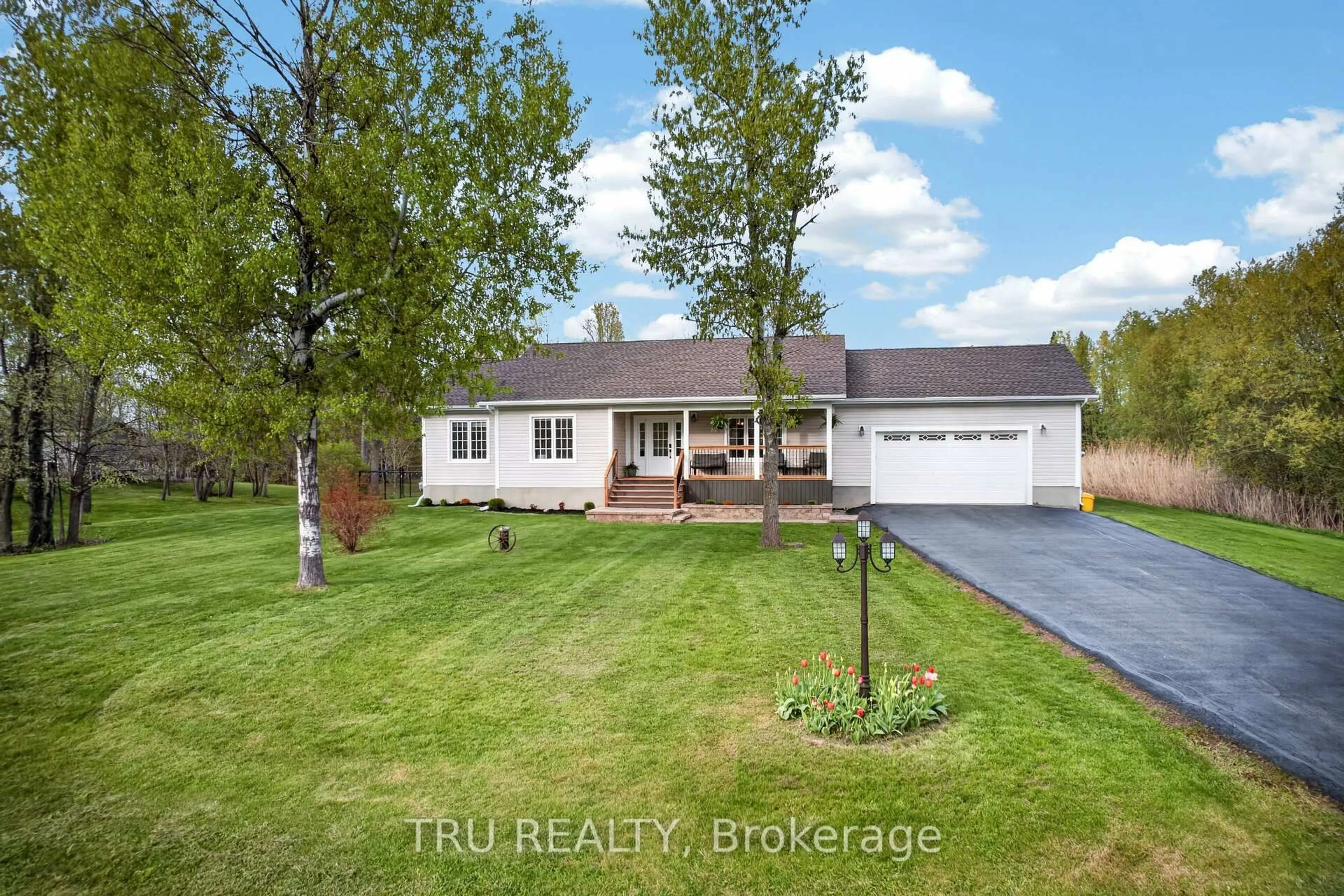 A pic from outside/outdoor area/front of a property/back of a property/a pic from drone, water/lake/river/ocean view for 52 Kimberly Ave, North Grenville Ontario K0G 1J0