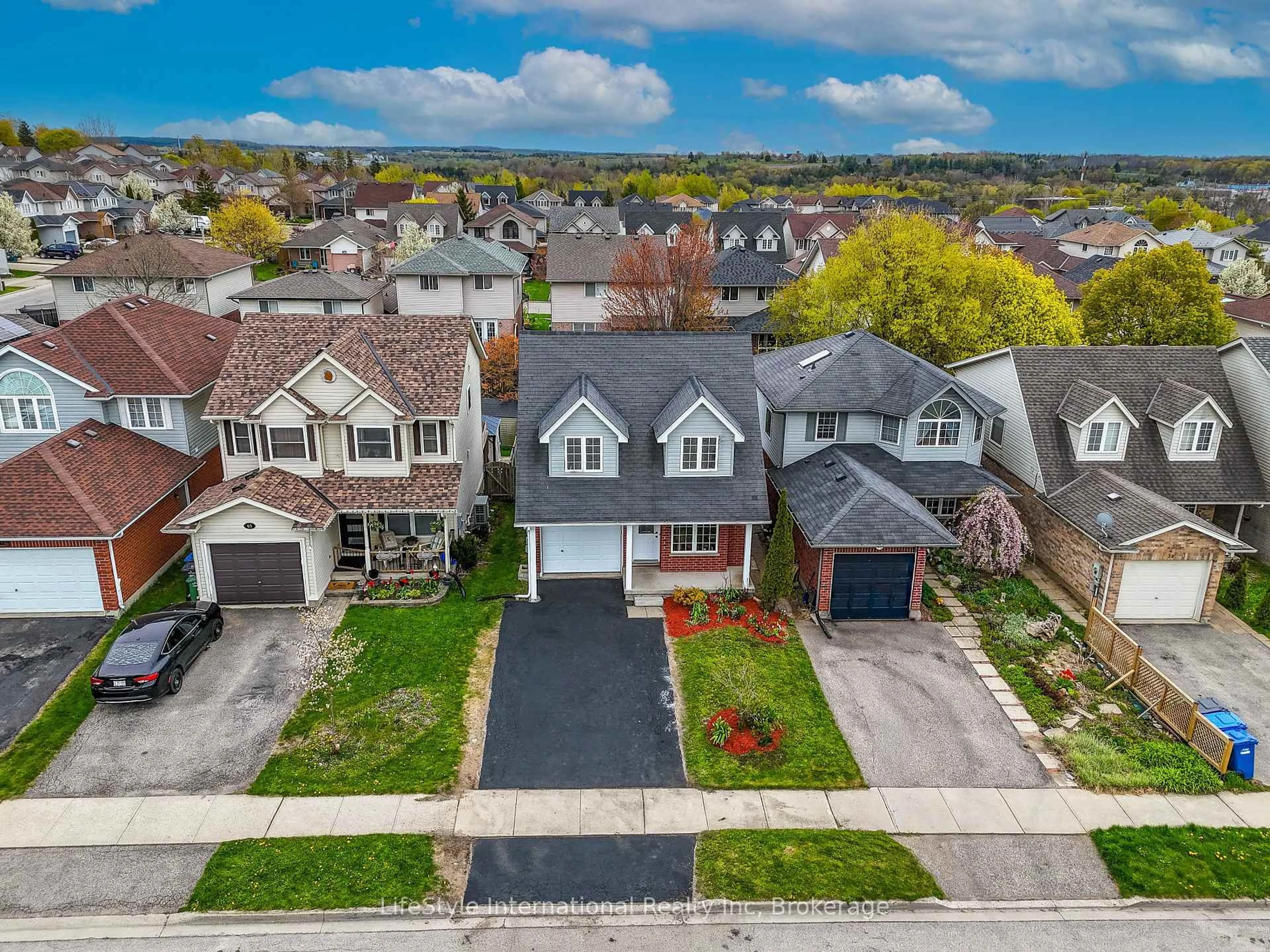 A pic from outside/outdoor area/front of a property/back of a property/a pic from drone, street for 63 Hagan Ave, Guelph Ontario N1E 7B7