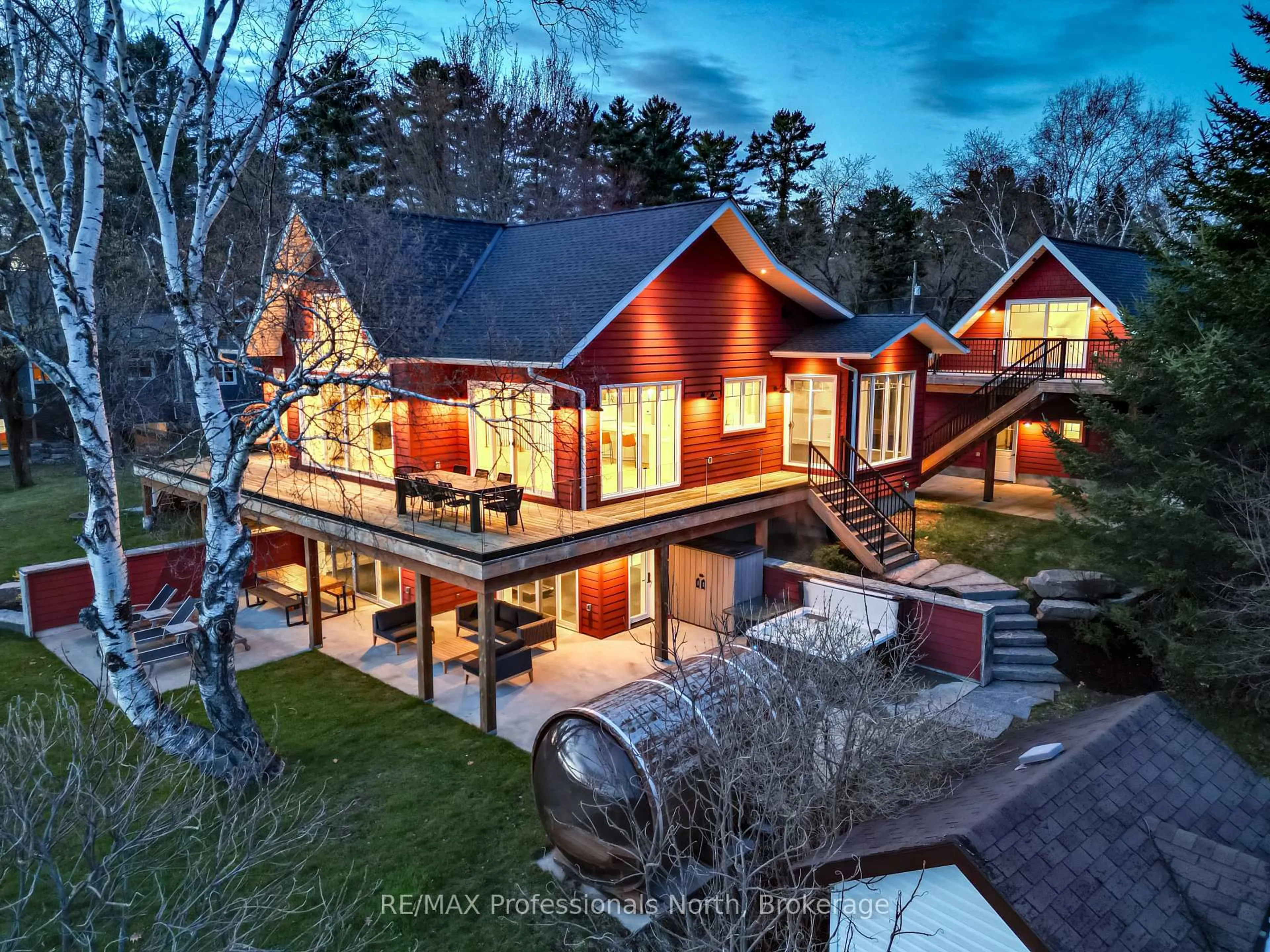 A pic from outside/outdoor area/front of a property/back of a property/a pic from drone, water/lake/river/ocean view for 36 Beach Rd, Huntsville Ontario P0B 1M0