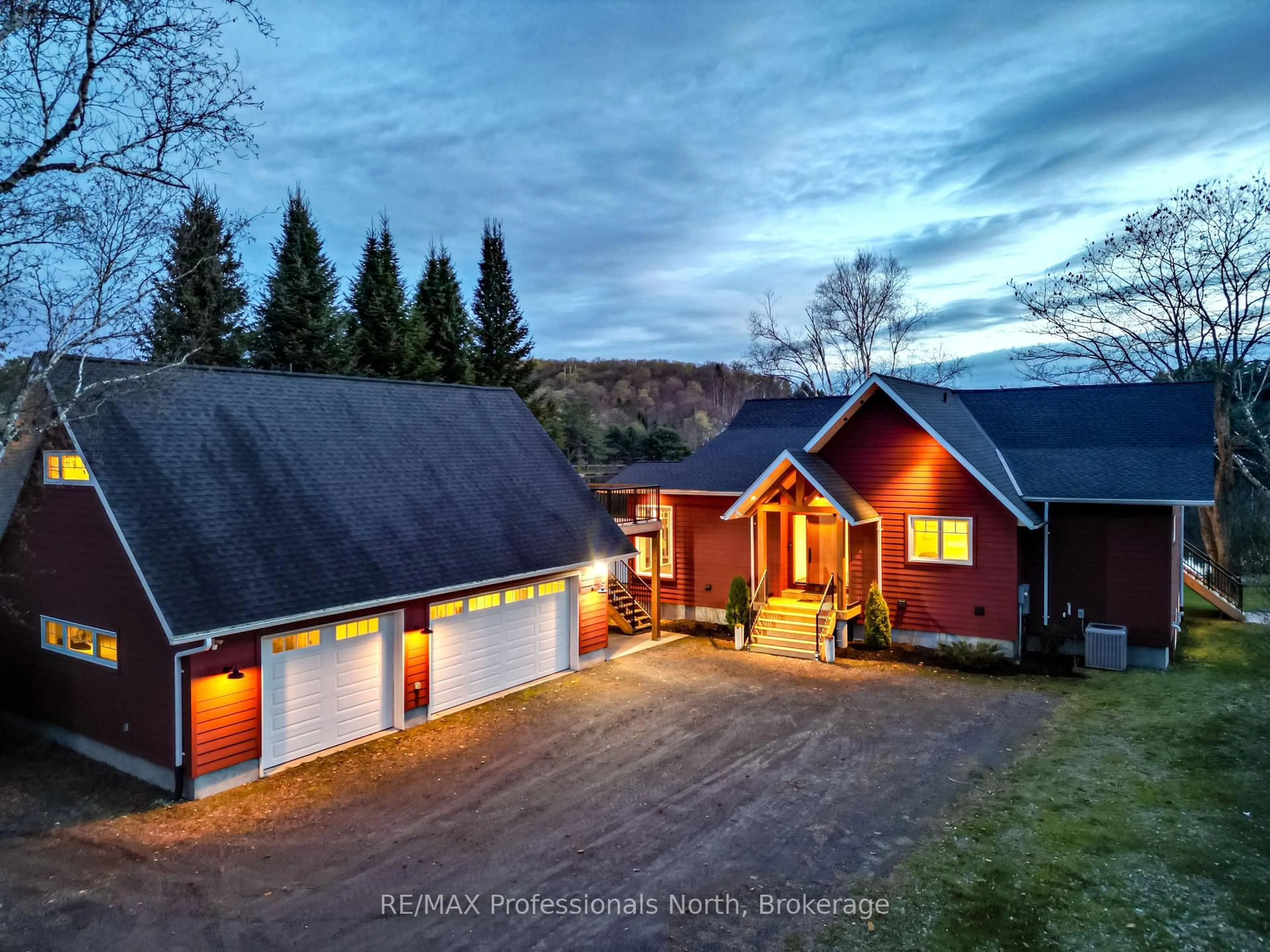 A pic from outside/outdoor area/front of a property/back of a property/a pic from drone, unknown for 36 Beach Rd, Huntsville Ontario P0B 1M0