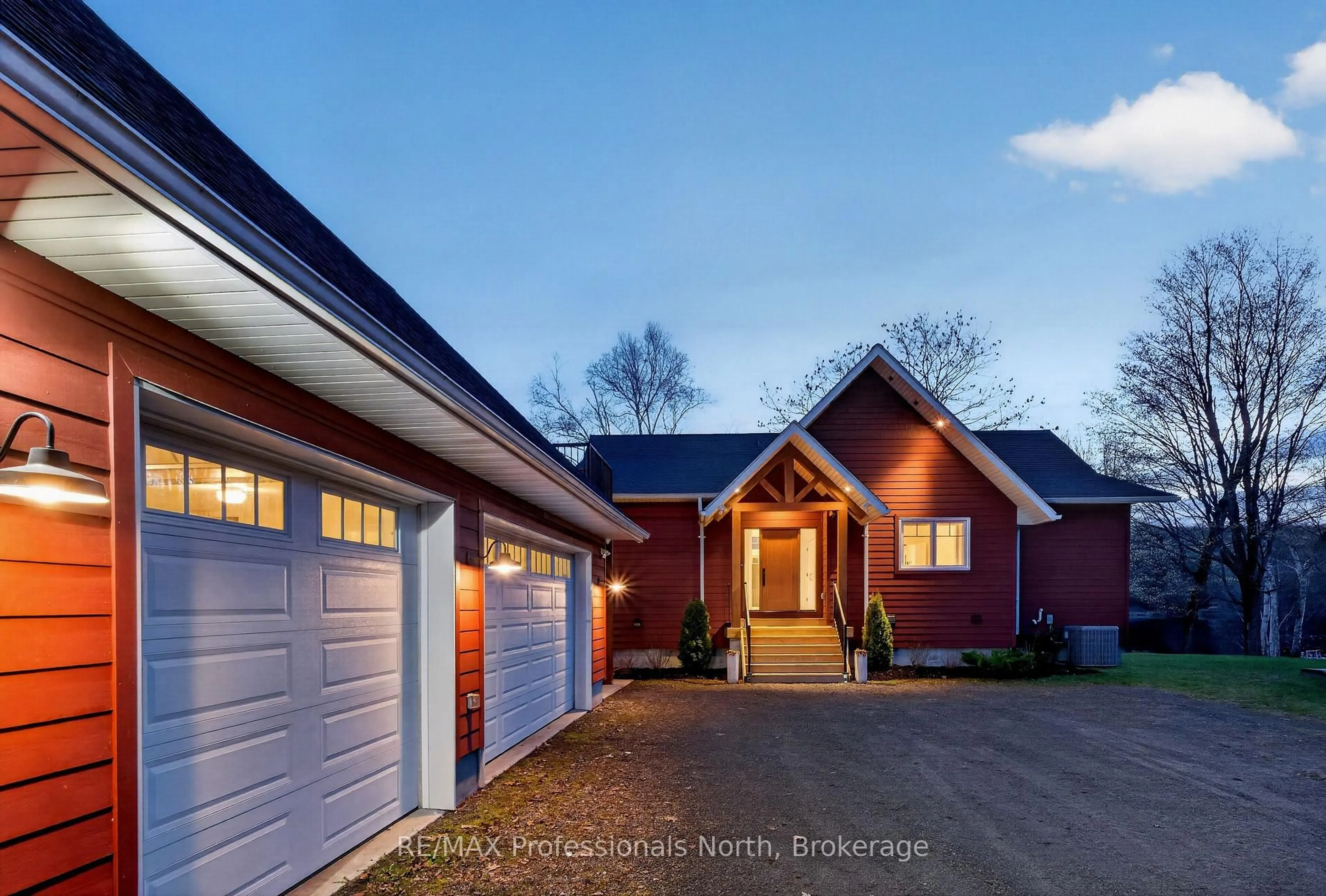 Home with brick exterior material, street for 36 Beach Rd, Huntsville Ontario P0B 1M0