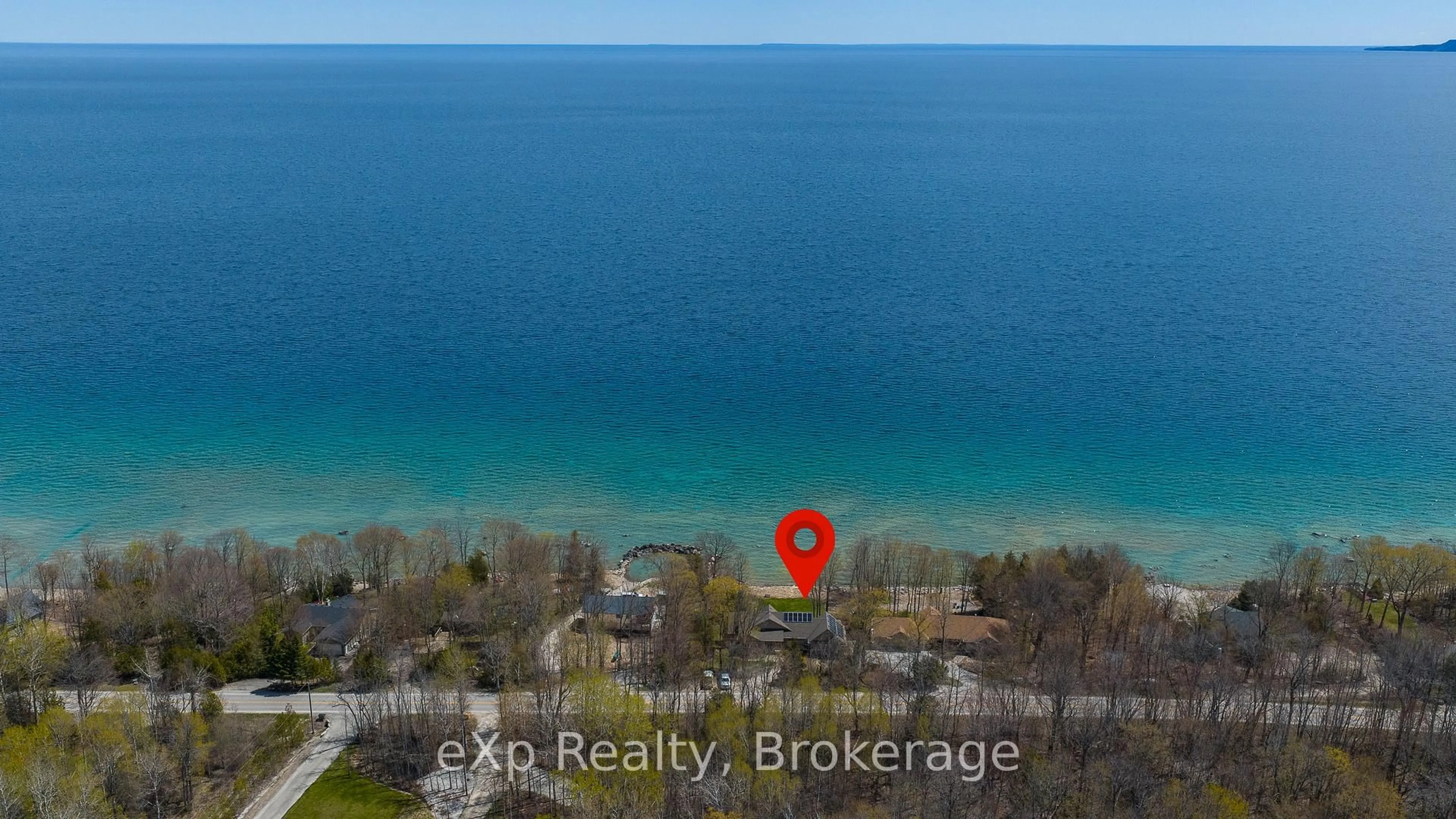 A pic from outside/outdoor area/front of a property/back of a property/a pic from drone, water/lake/river/ocean view for 504853 Grey Road 1, Georgian Bluffs Ontario N0H 1S0