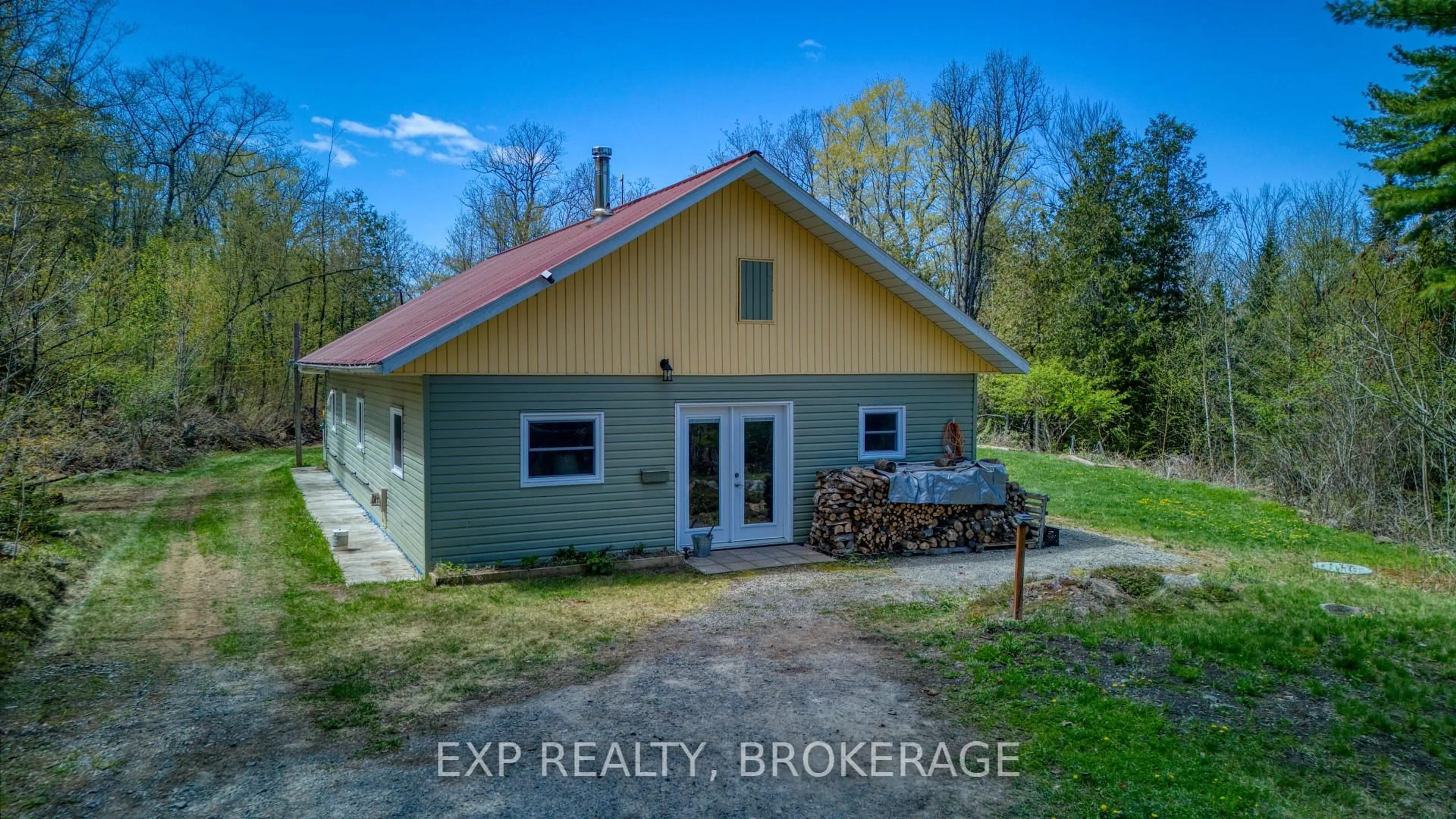 A pic from outside/outdoor area/front of a property/back of a property/a pic from drone, building for 371 Sherbrooke Dr, Maberly Ontario K0H 2B0