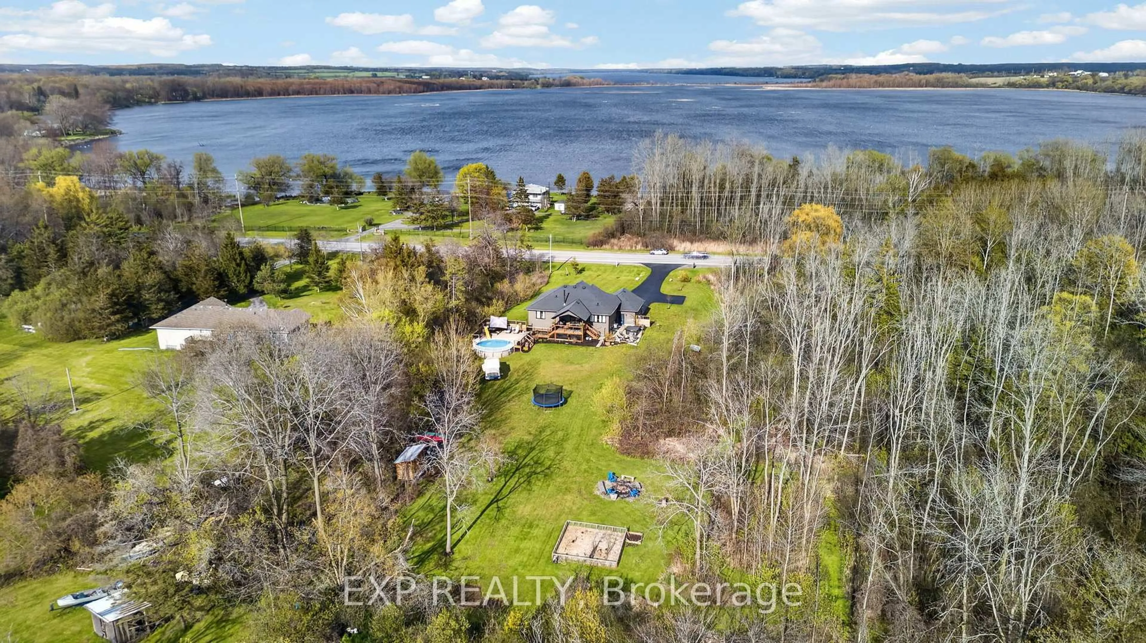 A pic from outside/outdoor area/front of a property/back of a property/a pic from drone, water/lake/river/ocean view for 20109 Loyalist Pkwy, Prince Edward County Ontario K0K 1T0
