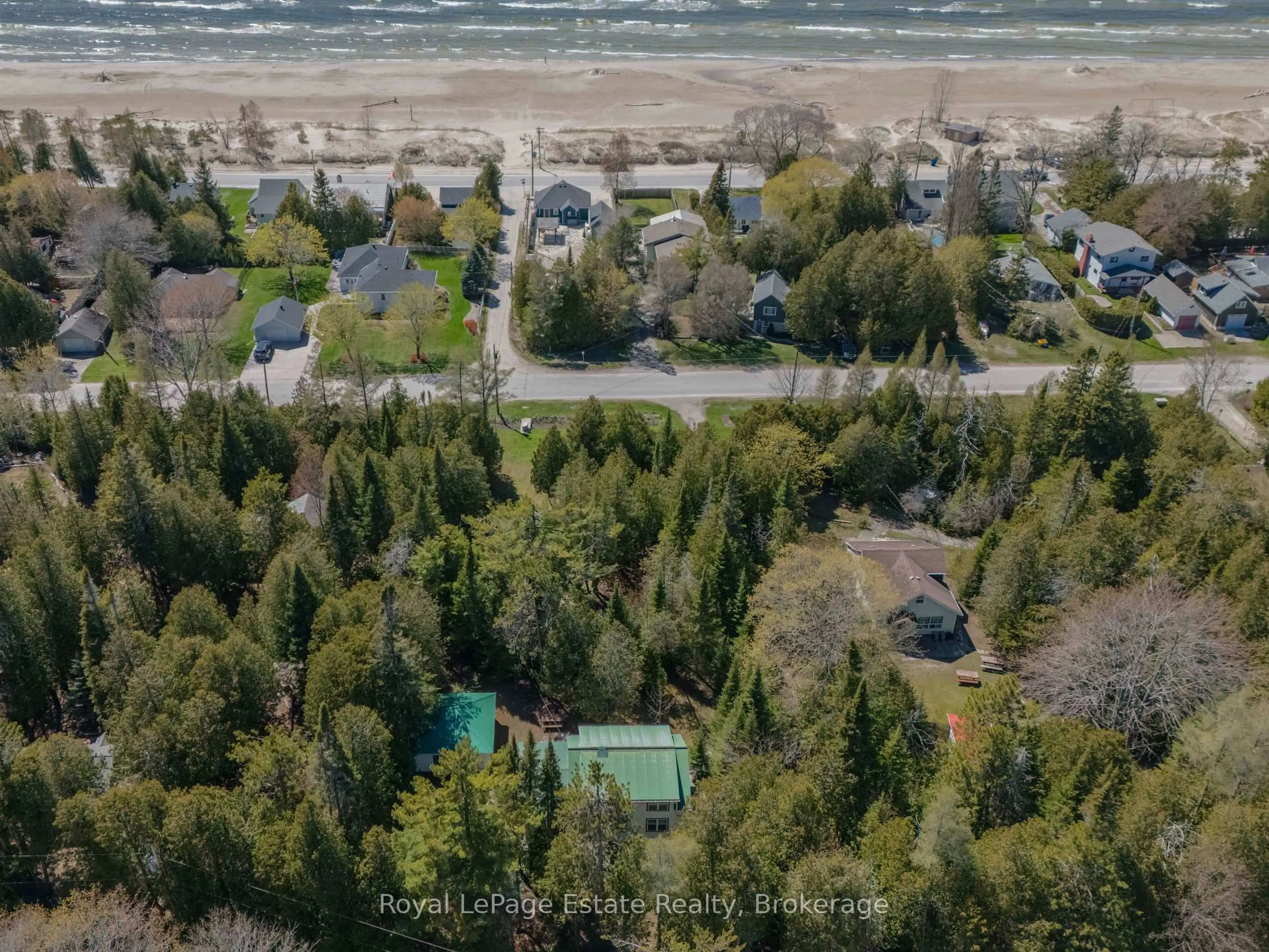 A pic from outside/outdoor area/front of a property/back of a property/a pic from drone, forest/trees view for 138 Third Ave, South Bruce Peninsula Ontario N0H 2G0