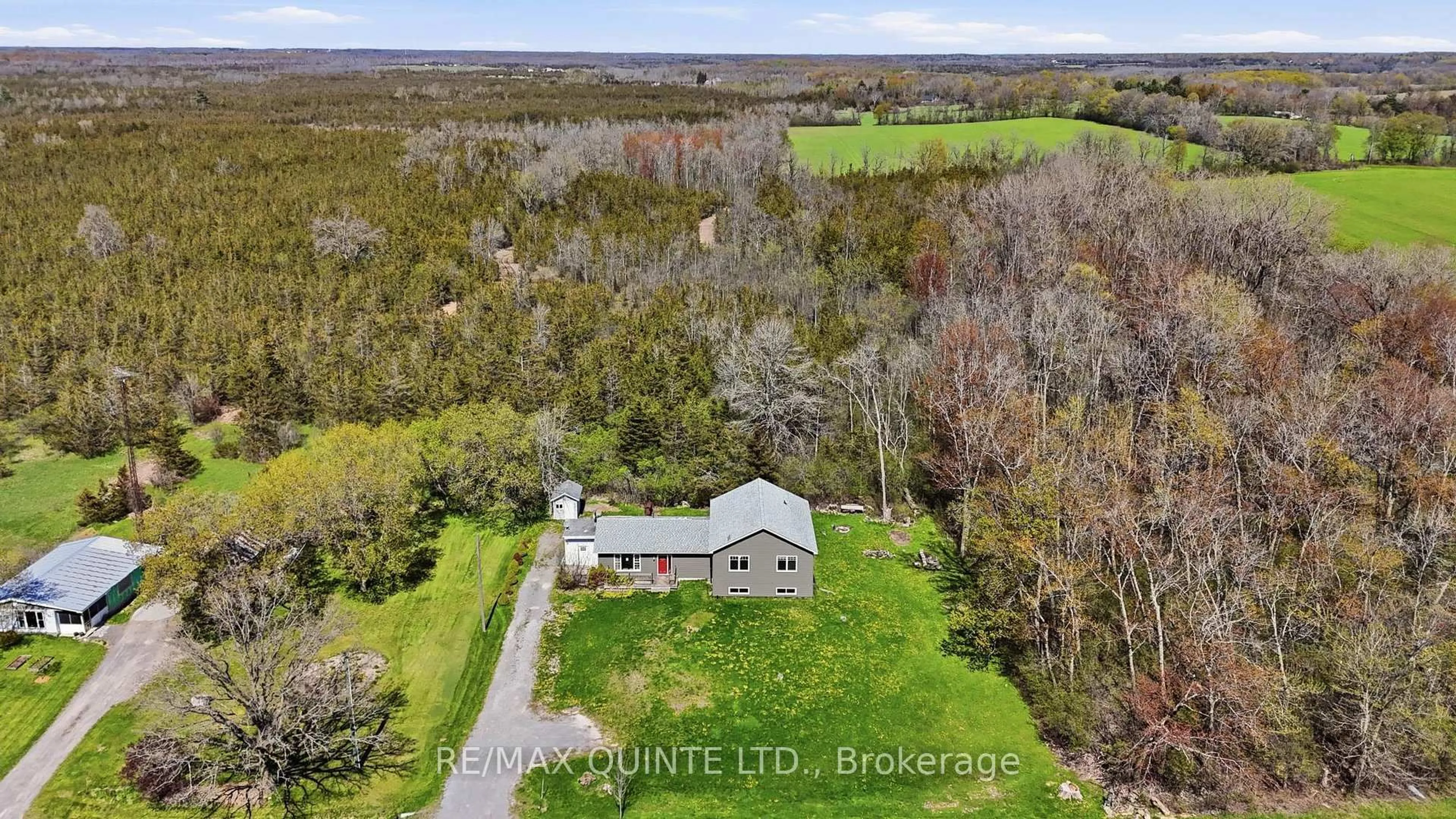 A pic from outside/outdoor area/front of a property/back of a property/a pic from drone, water/lake/river/ocean view for 1894 County Road 5 Rd, Prince Edward County Ontario K0K 2T0