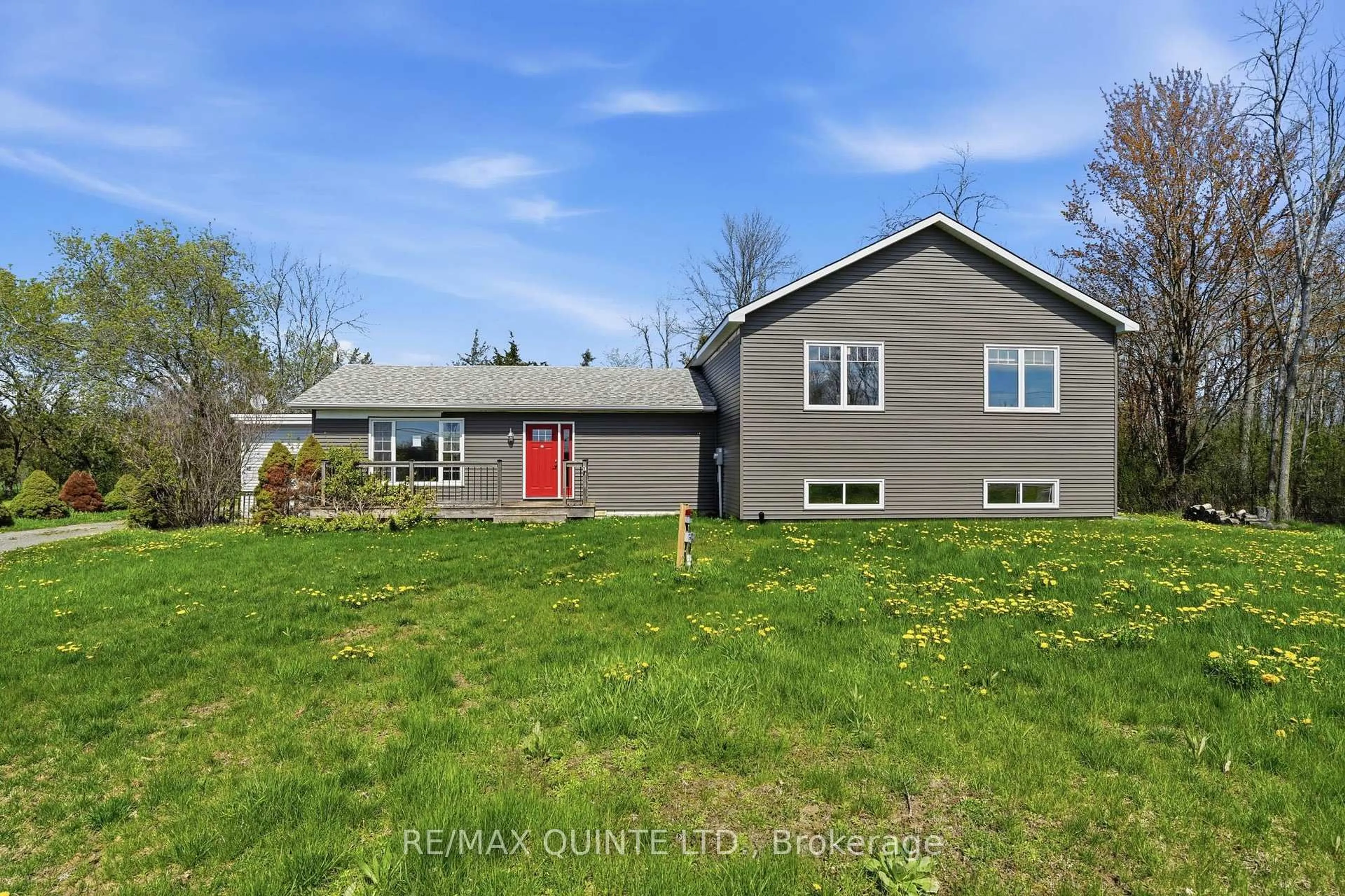 A pic from outside/outdoor area/front of a property/back of a property/a pic from drone, water/lake/river/ocean view for 1894 County Road 5 Rd, Prince Edward County Ontario K0K 2T0
