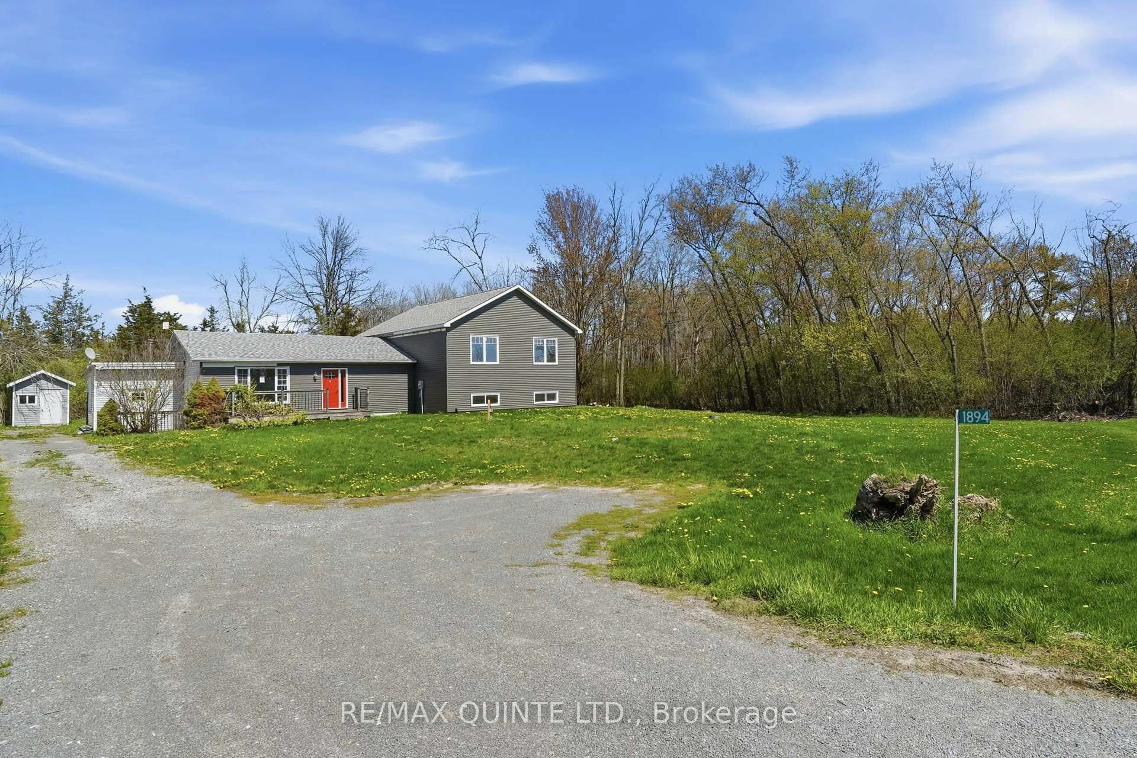 A pic from outside/outdoor area/front of a property/back of a property/a pic from drone, street for 1894 County Road 5 Rd, Prince Edward County Ontario K0K 2T0