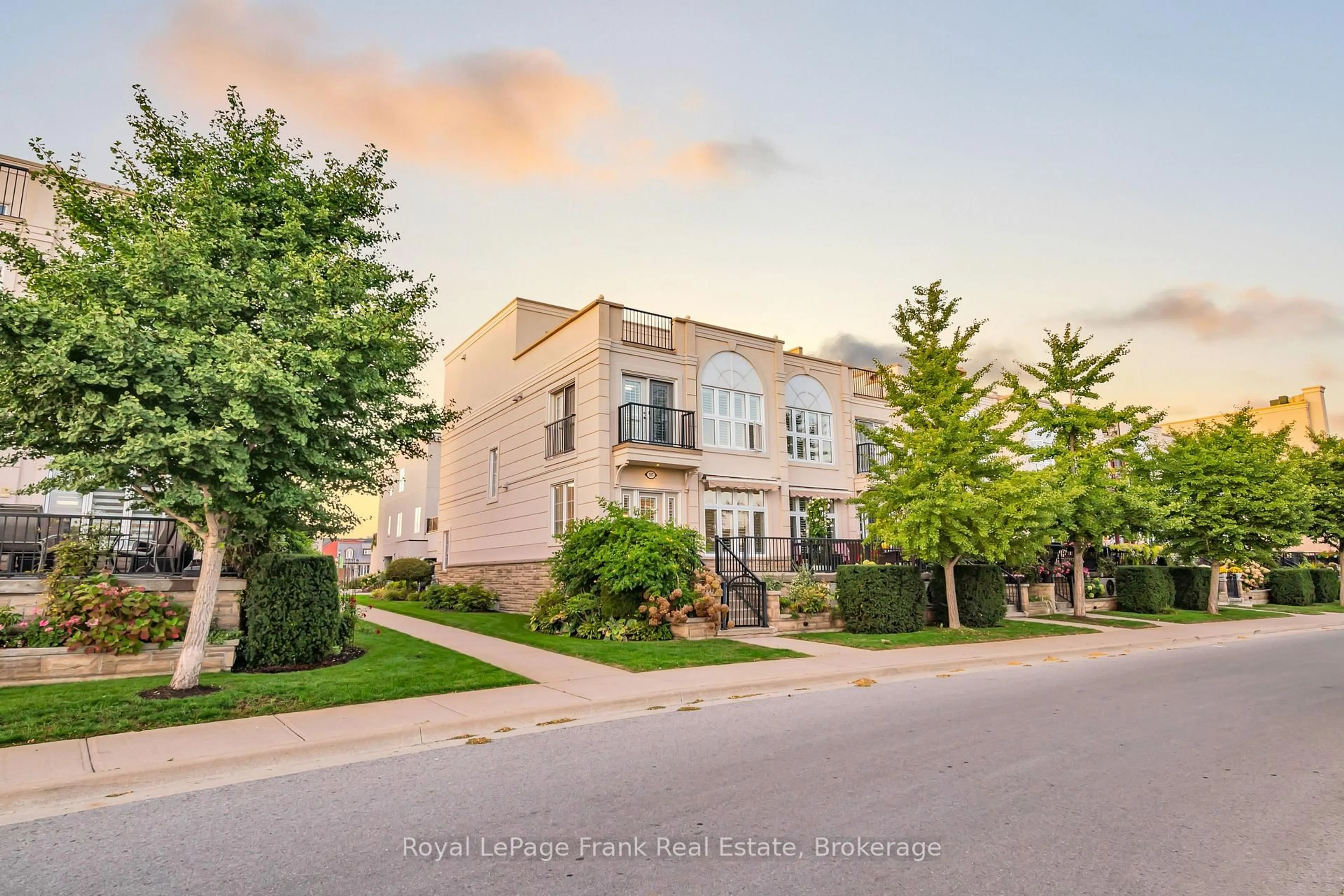 A pic from outside/outdoor area/front of a property/back of a property/a pic from drone, street for 165 Division St #107, Cobourg Ontario K9A 0B3