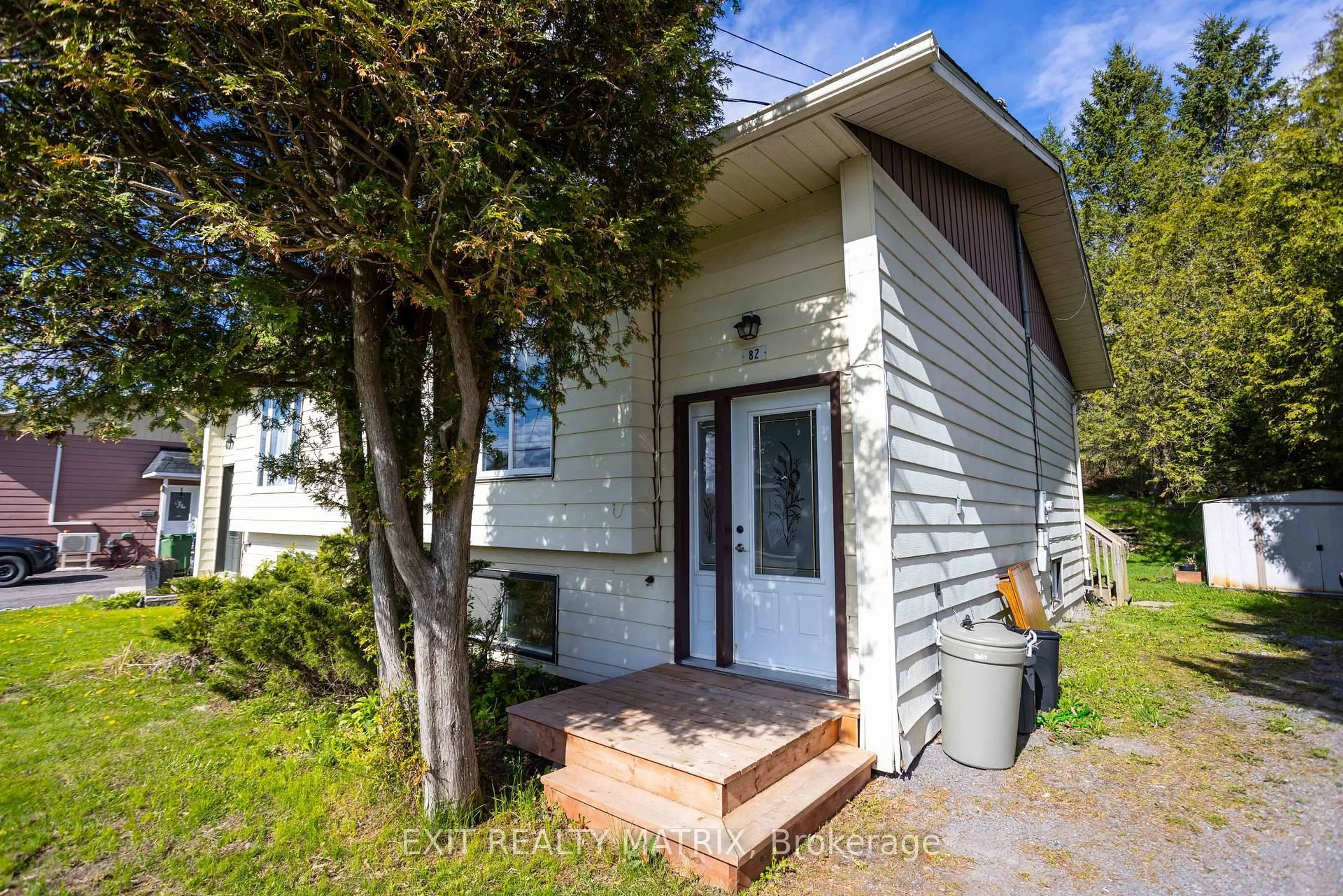 Home with vinyl exterior material, street for 82 Bertha Ave, Champlain Ontario K0B 1R0