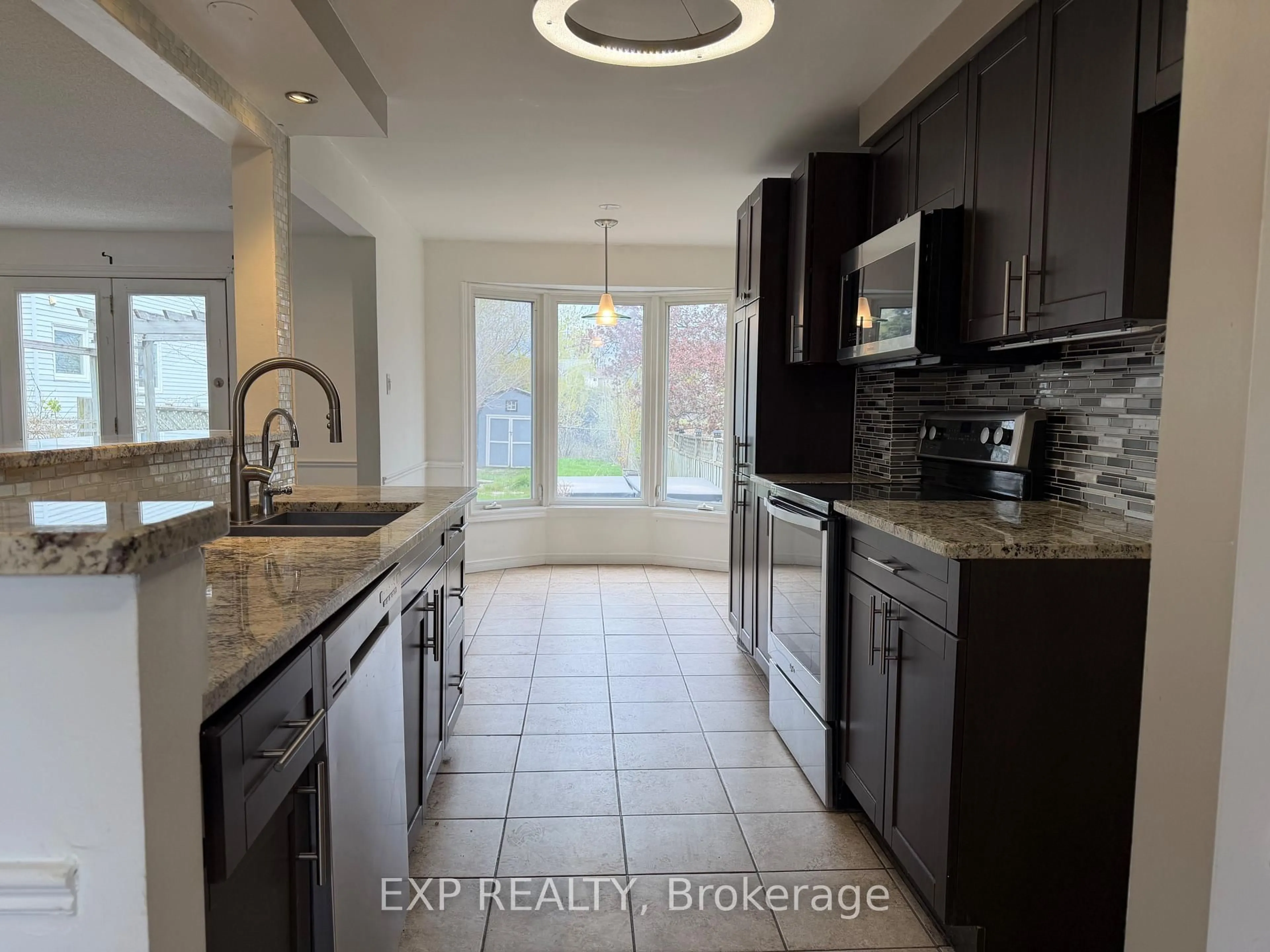 Open concept kitchen, ceramic/tile floor for 279 Auden Rd, Guelph Ontario N1E 6N5