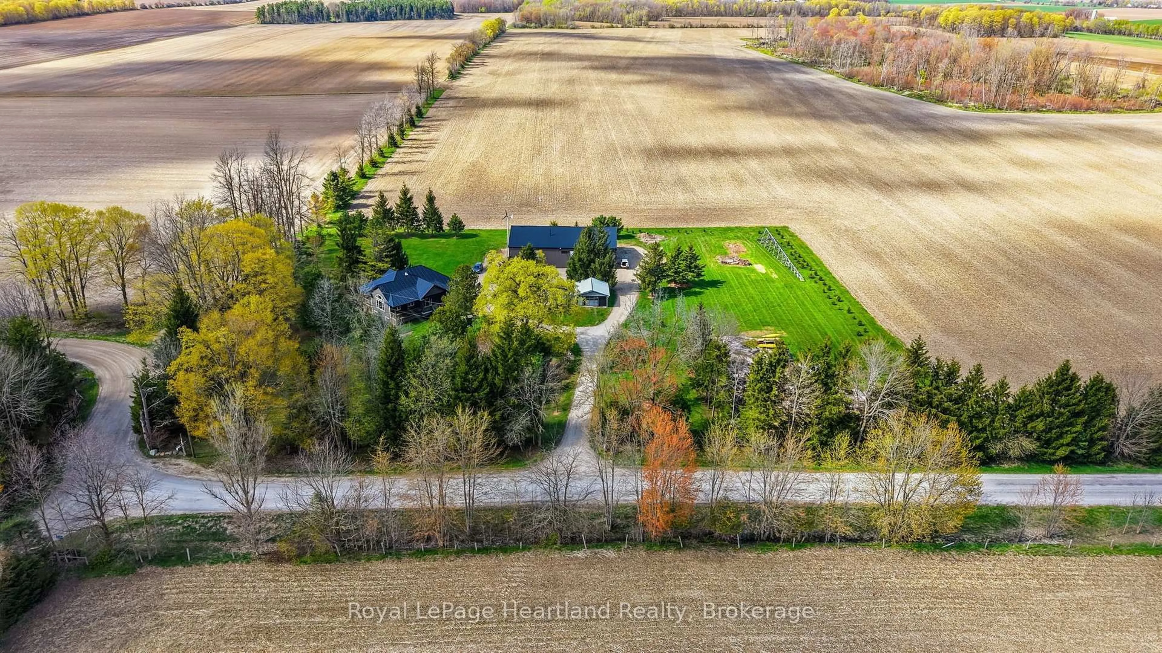 A pic from outside/outdoor area/front of a property/back of a property/a pic from drone, water/lake/river/ocean view for 5106 5th Line, Minto Ontario N0G 2P0