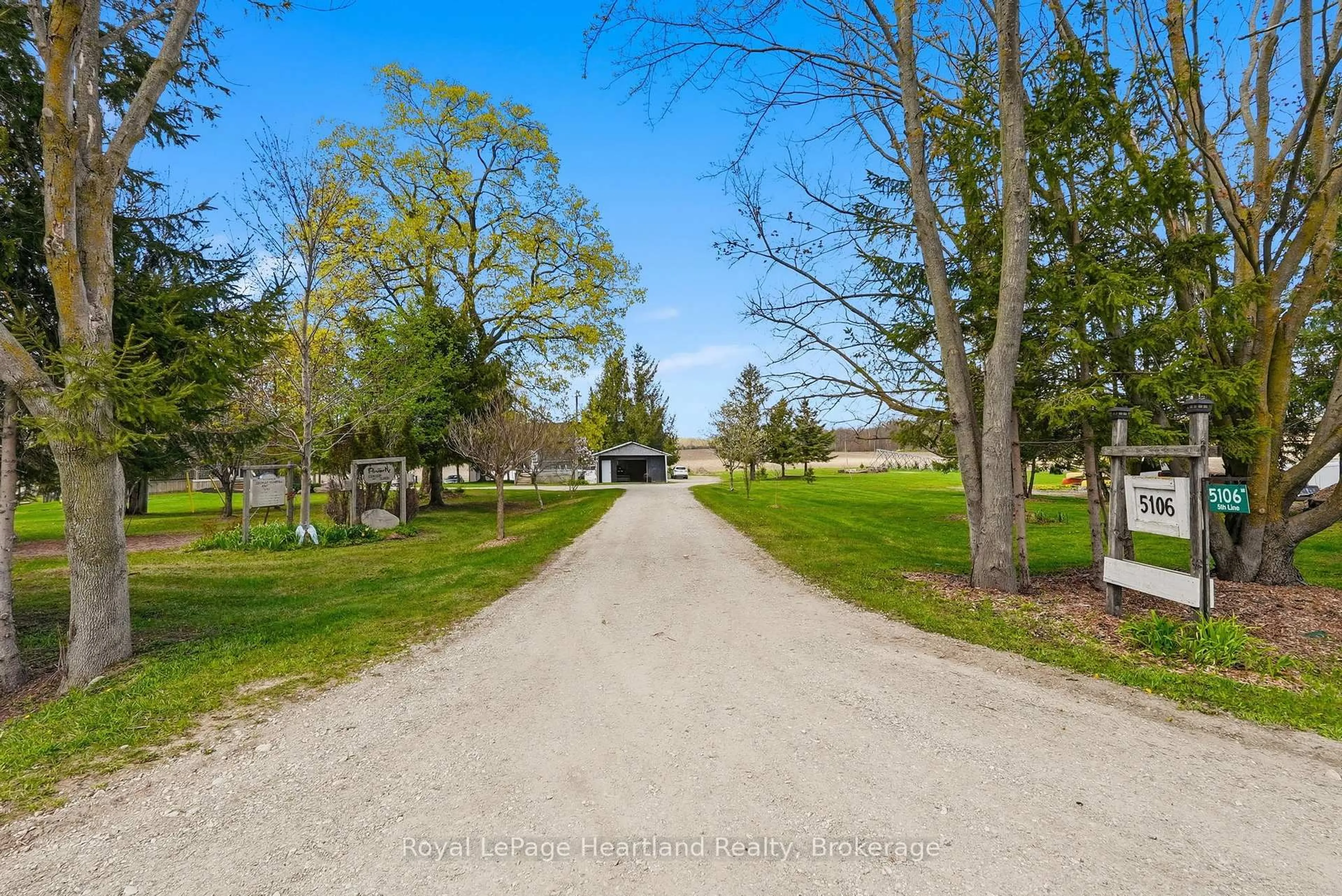 A pic from outside/outdoor area/front of a property/back of a property/a pic from drone, street for 5106 5th Line, Minto Ontario N0G 2P0