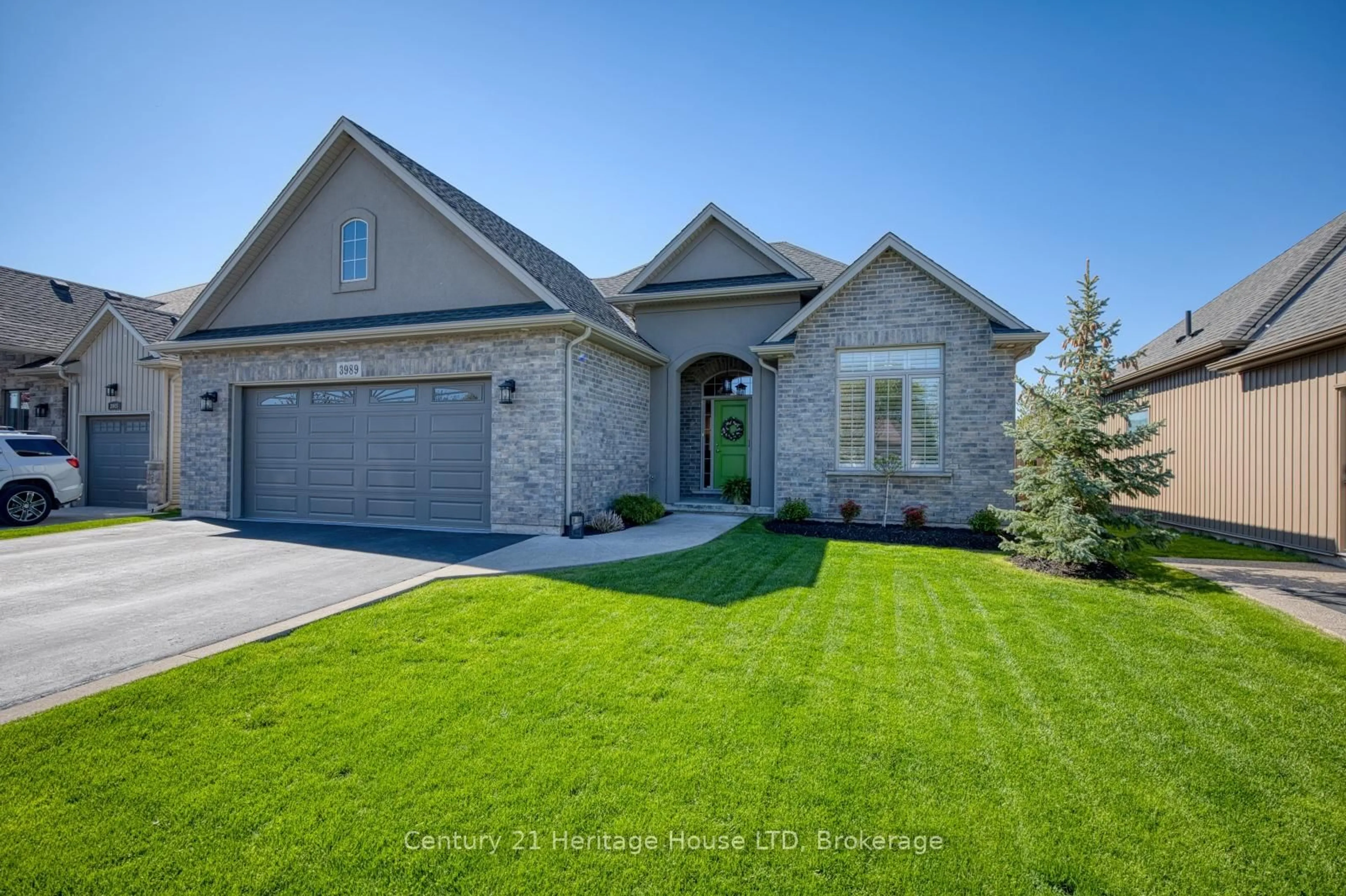 Home with brick exterior material, street for 3989 Village Creek Dr, Fort Erie Ontario L0S 1S0