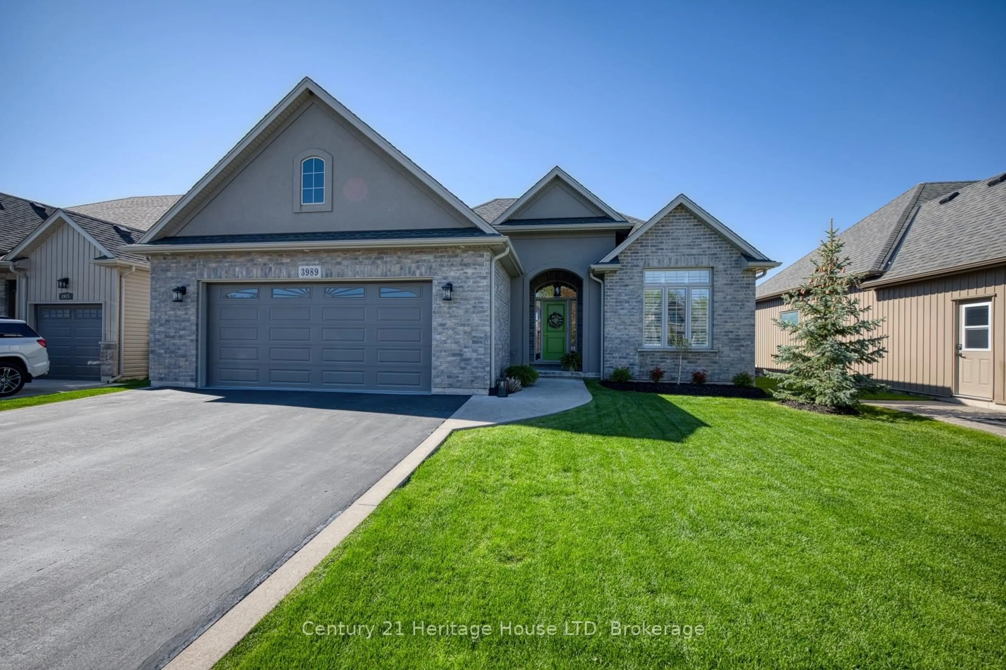 Home with brick exterior material, street for 3989 Village Creek Dr, Fort Erie Ontario L0S 1S0