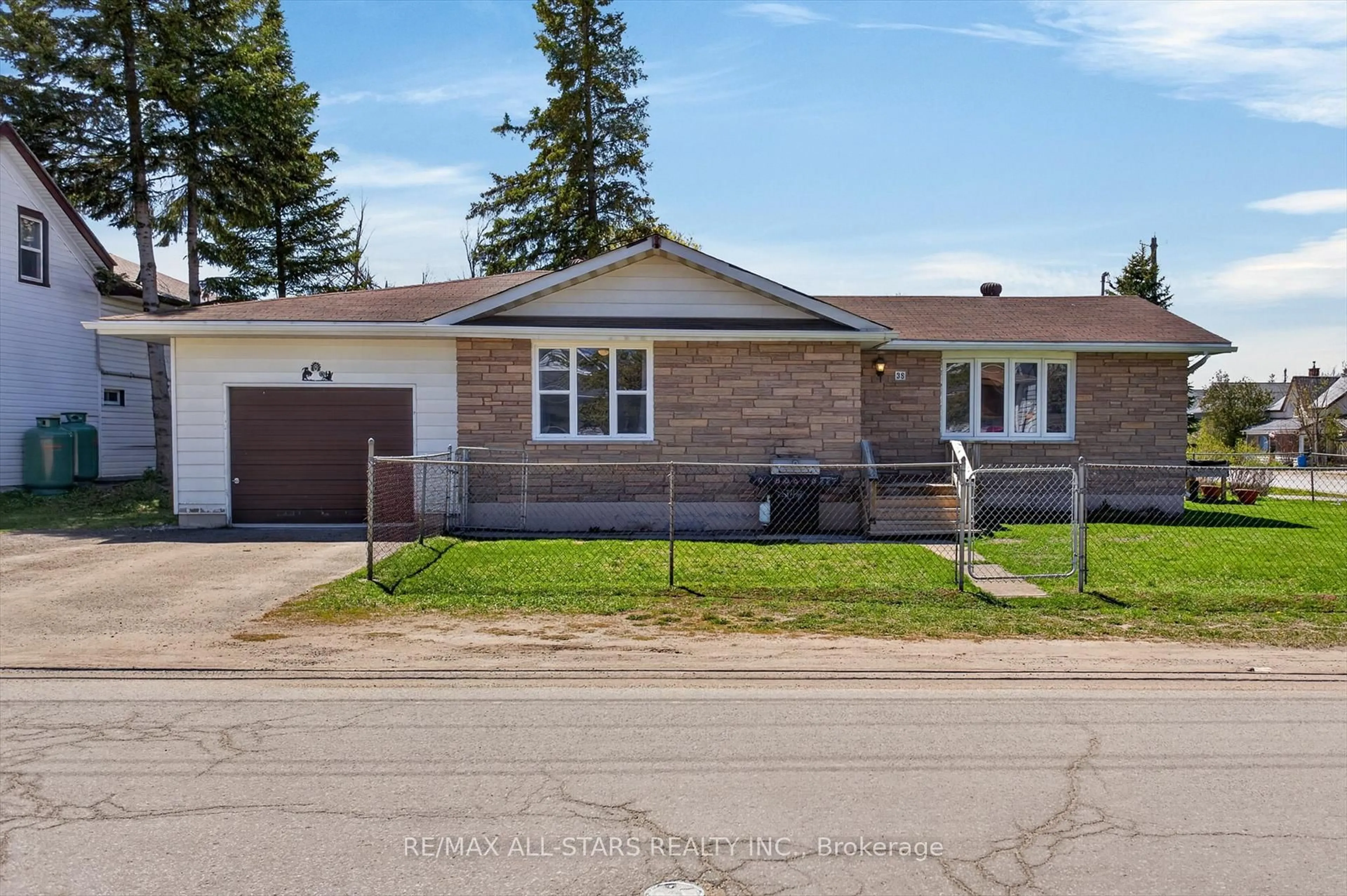 Home with brick exterior material, street for 38 Elliot St, Kawartha Lakes Ontario K0M 1N0