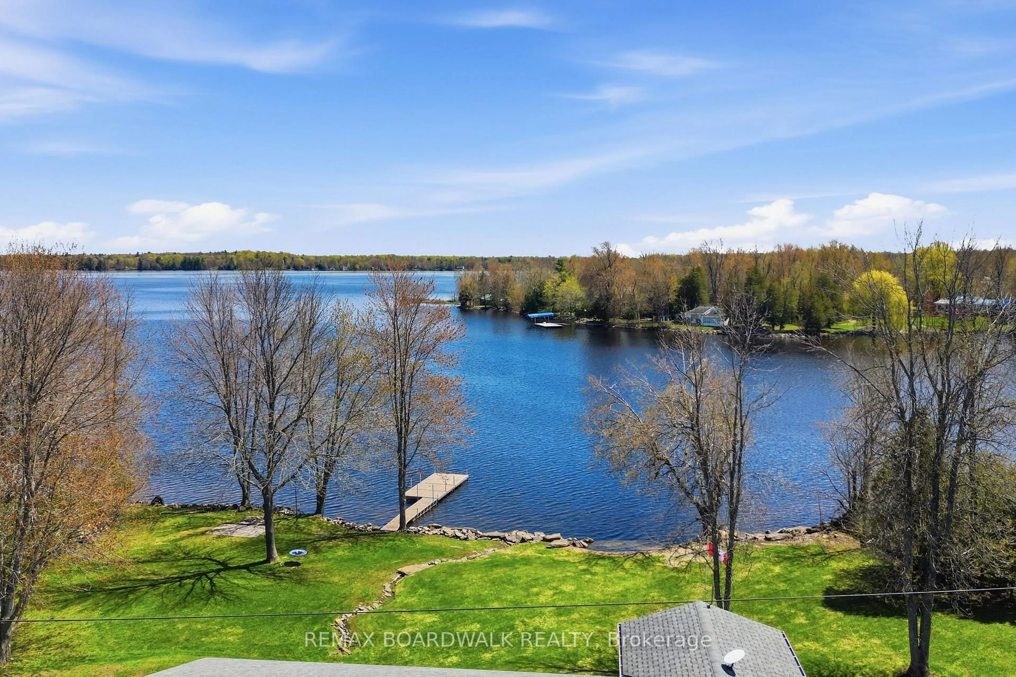 A pic from outside/outdoor area/front of a property/back of a property/a pic from drone, water/lake/river/ocean view for 100 Mcculloughs Landing, Perth Ontario K7H 3C8