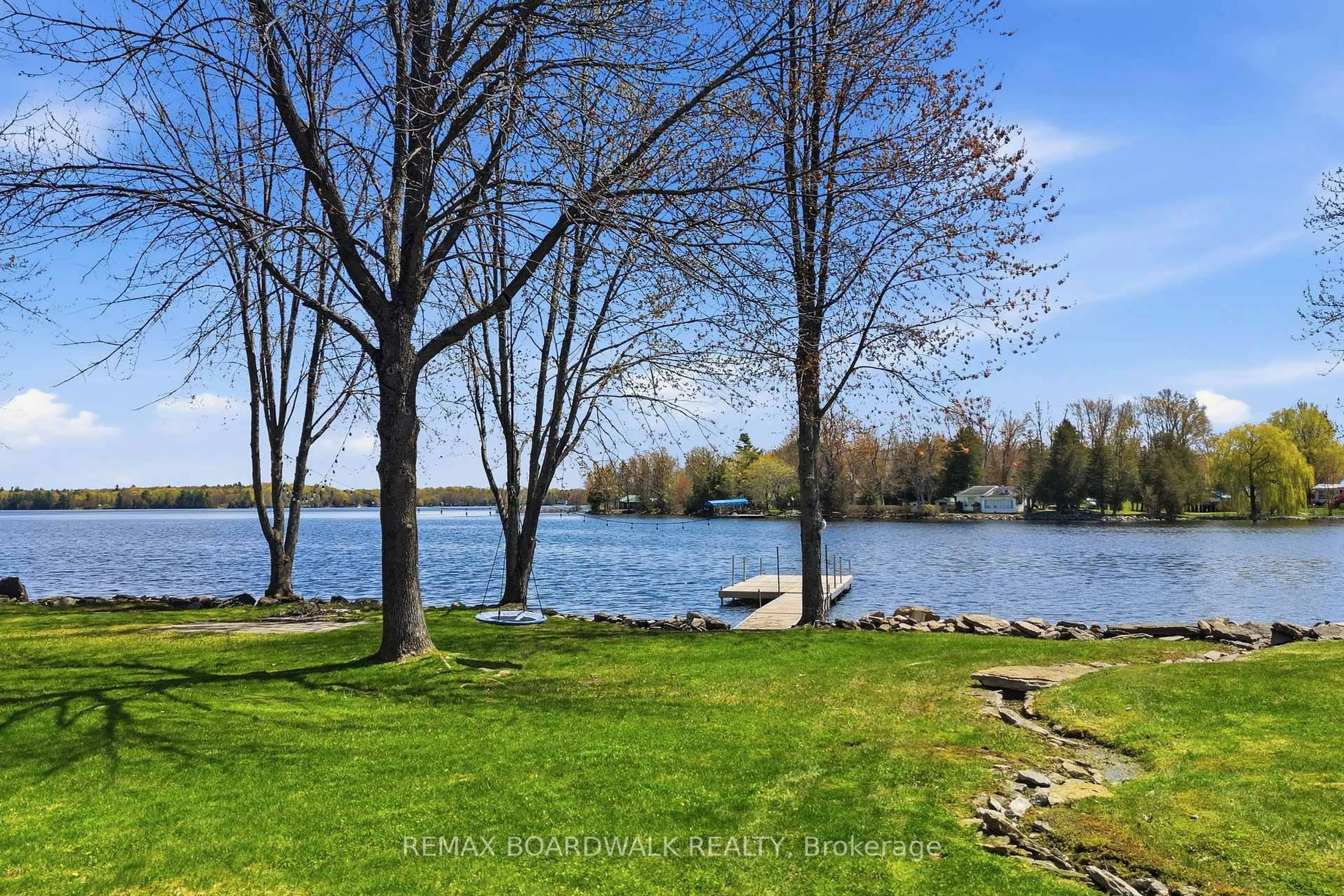 A pic from outside/outdoor area/front of a property/back of a property/a pic from drone, water/lake/river/ocean view for 100 Mcculloughs Landing, Perth Ontario K7H 3C8