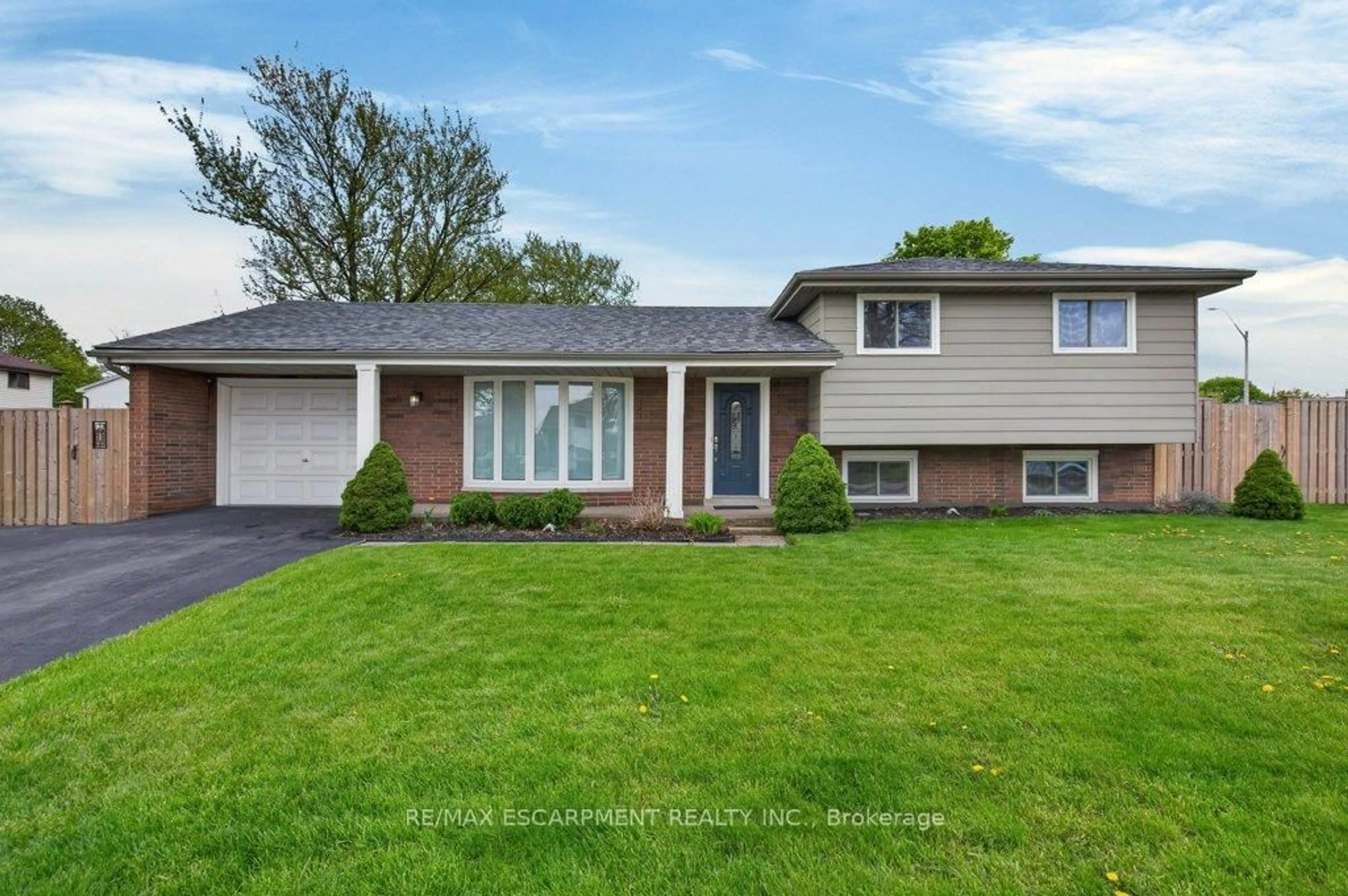 Home with vinyl exterior material, street for 4 Camelot Dr, Hamilton Ontario L8V 2L2