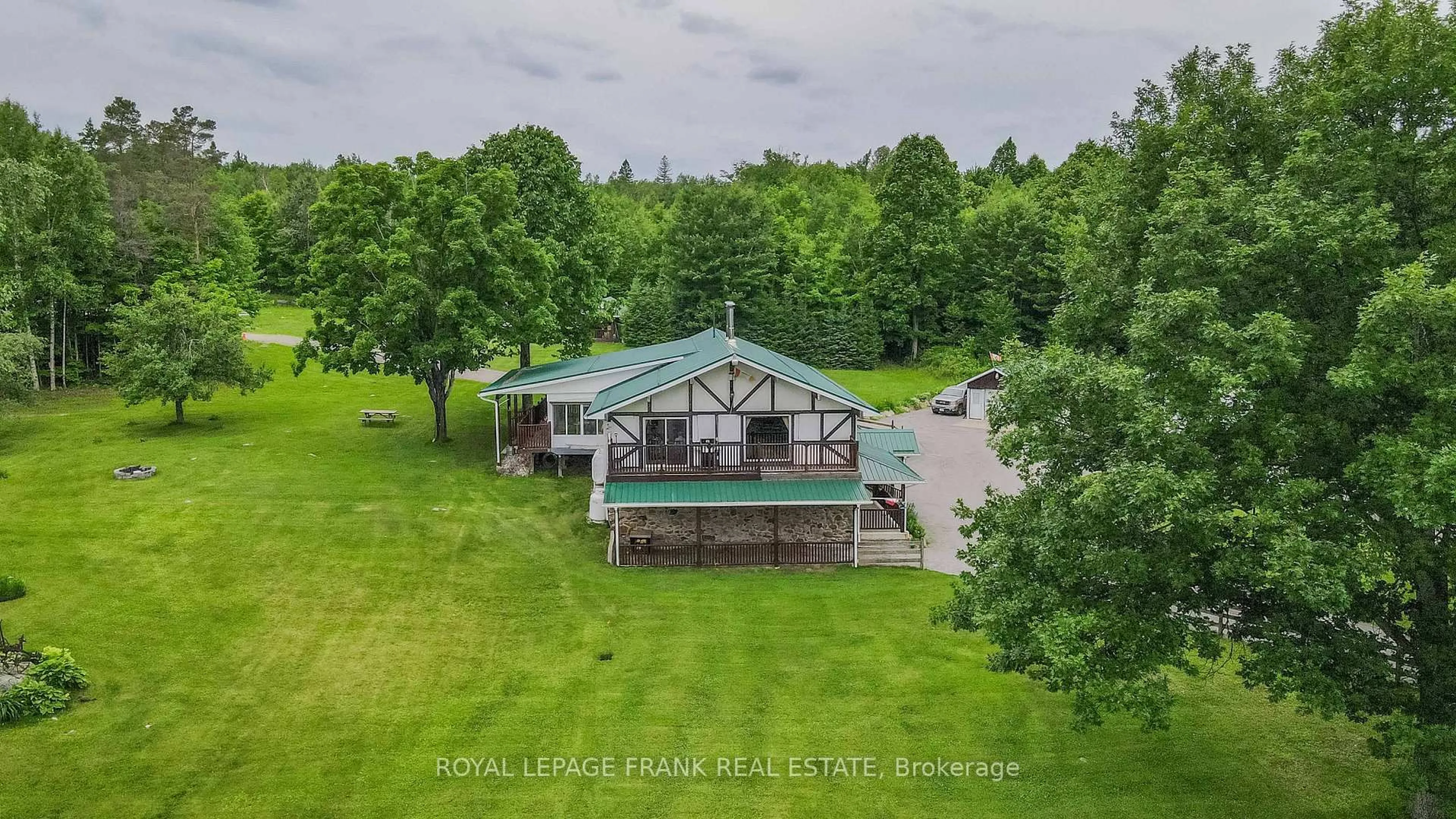 A pic from outside/outdoor area/front of a property/back of a property/a pic from drone, water/lake/river/ocean view for 497 Mooney Rd, Bancroft Ontario K0L 1C0