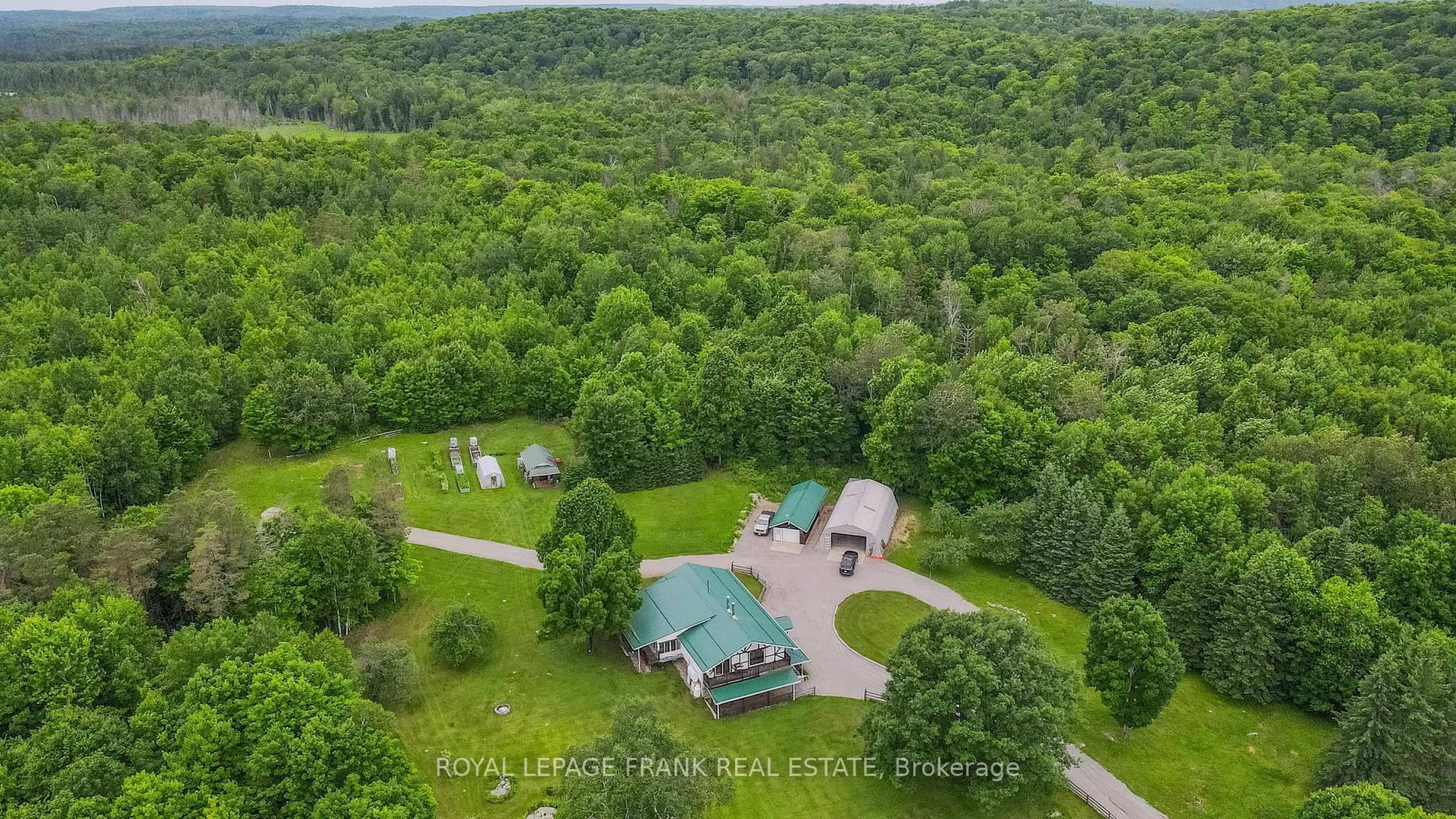 A pic from outside/outdoor area/front of a property/back of a property/a pic from drone, forest/trees view for 497 Mooney Rd, Bancroft Ontario K0L 1C0