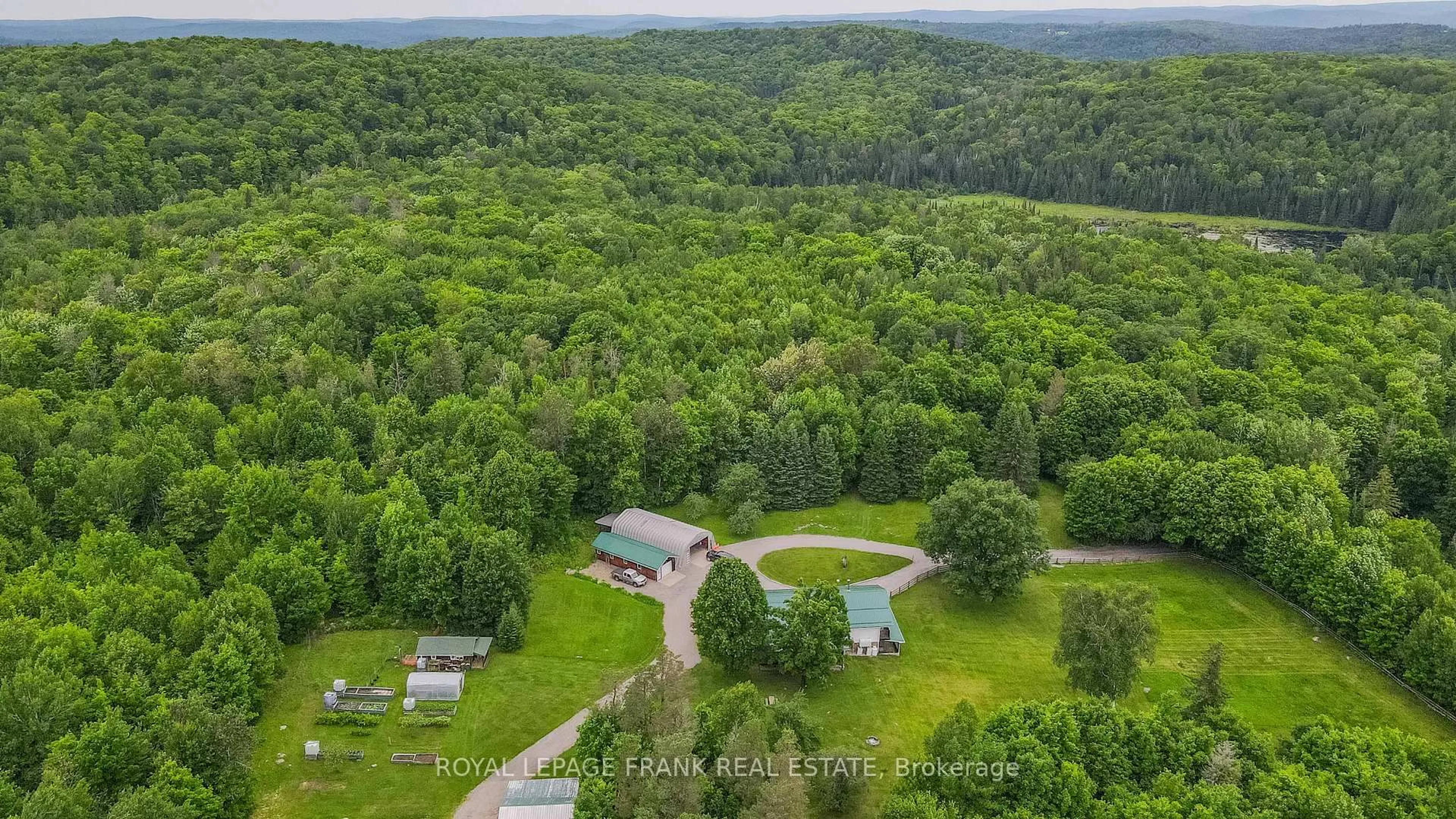 A pic from outside/outdoor area/front of a property/back of a property/a pic from drone, forest/trees view for 497 Mooney Rd, Bancroft Ontario K0L 1C0