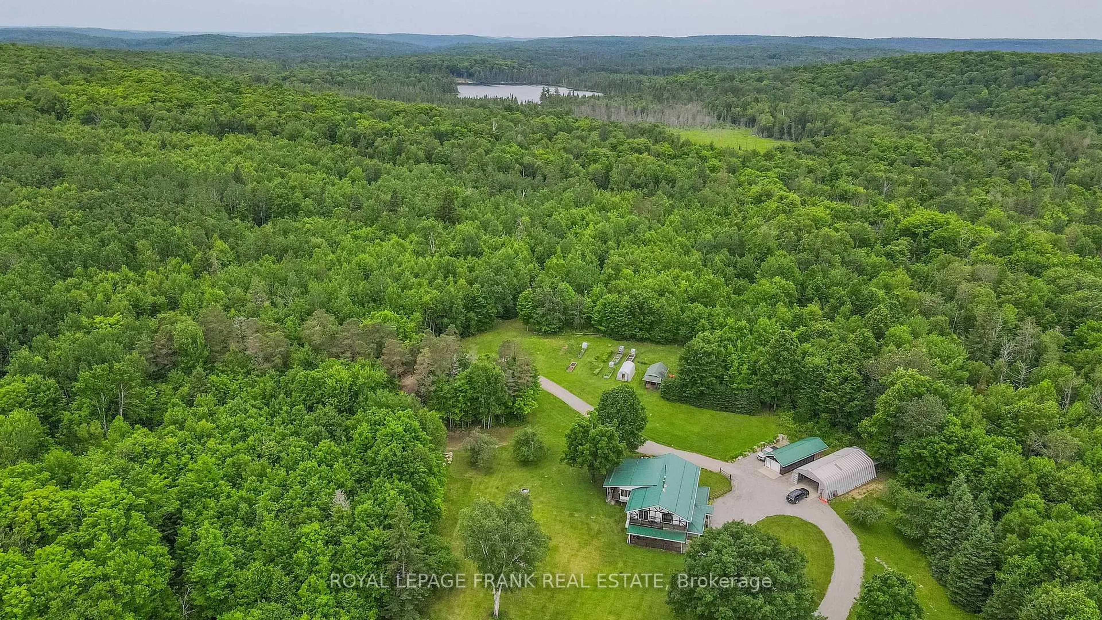 A pic from outside/outdoor area/front of a property/back of a property/a pic from drone, water/lake/river/ocean view for 497 Mooney Rd, Bancroft Ontario K0L 1C0