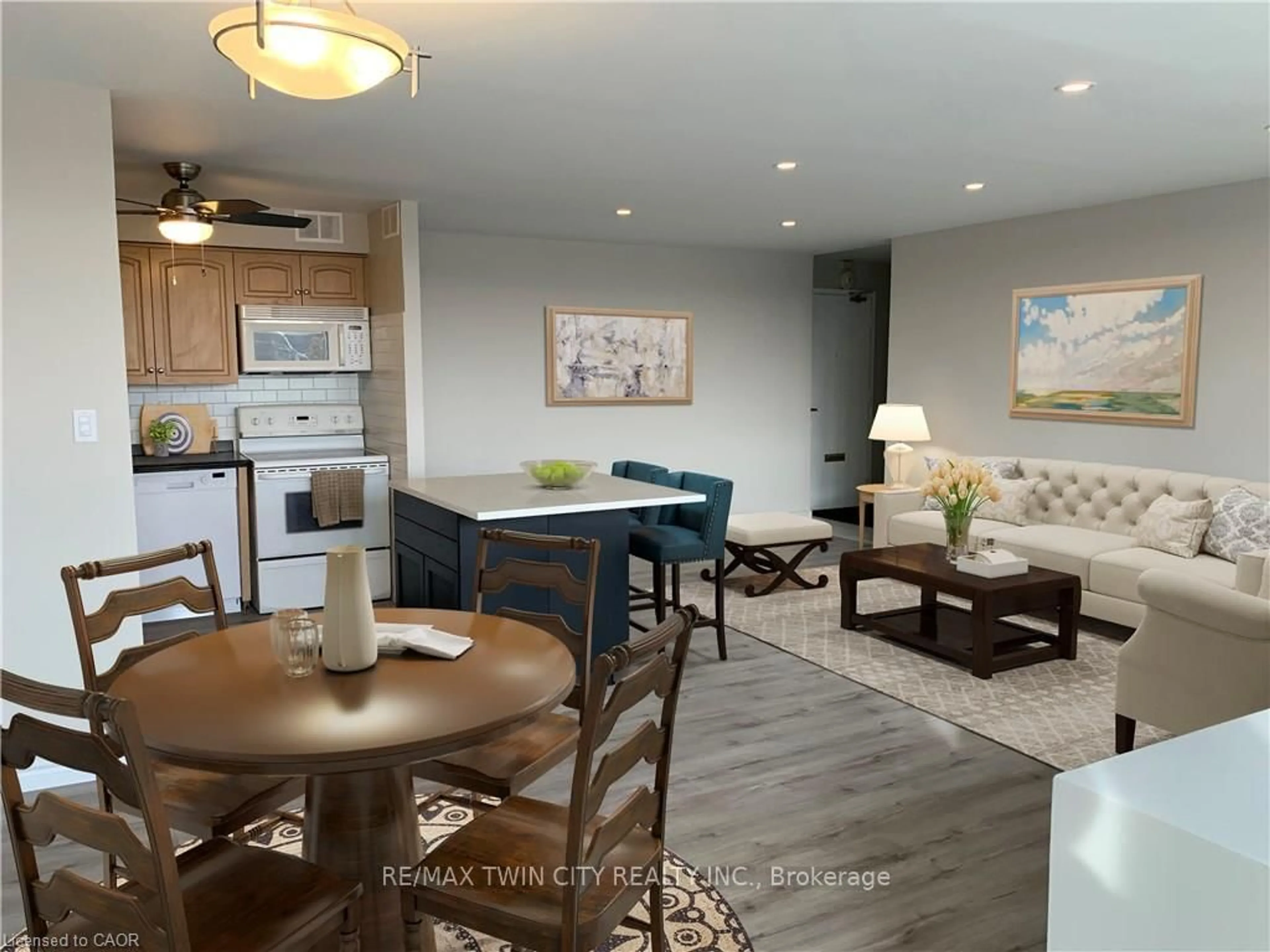 Open concept kitchen, wood/laminate floor for 24 Midland Dr #306, Kitchener Ontario N2A 2A8