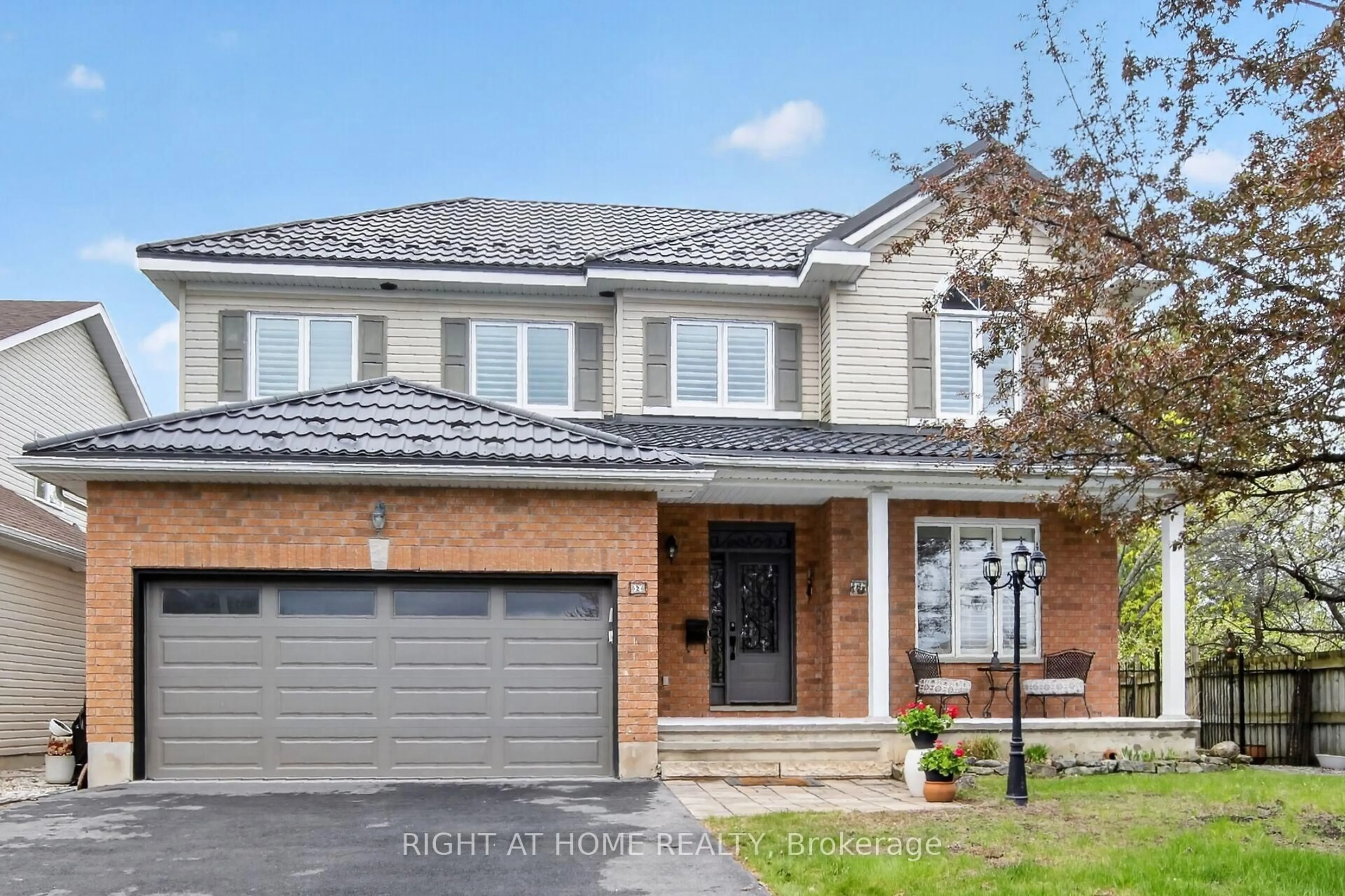 Home with brick exterior material, street for 2 Harry Douglas Dr, Stittsville Ontario K2S 1M4