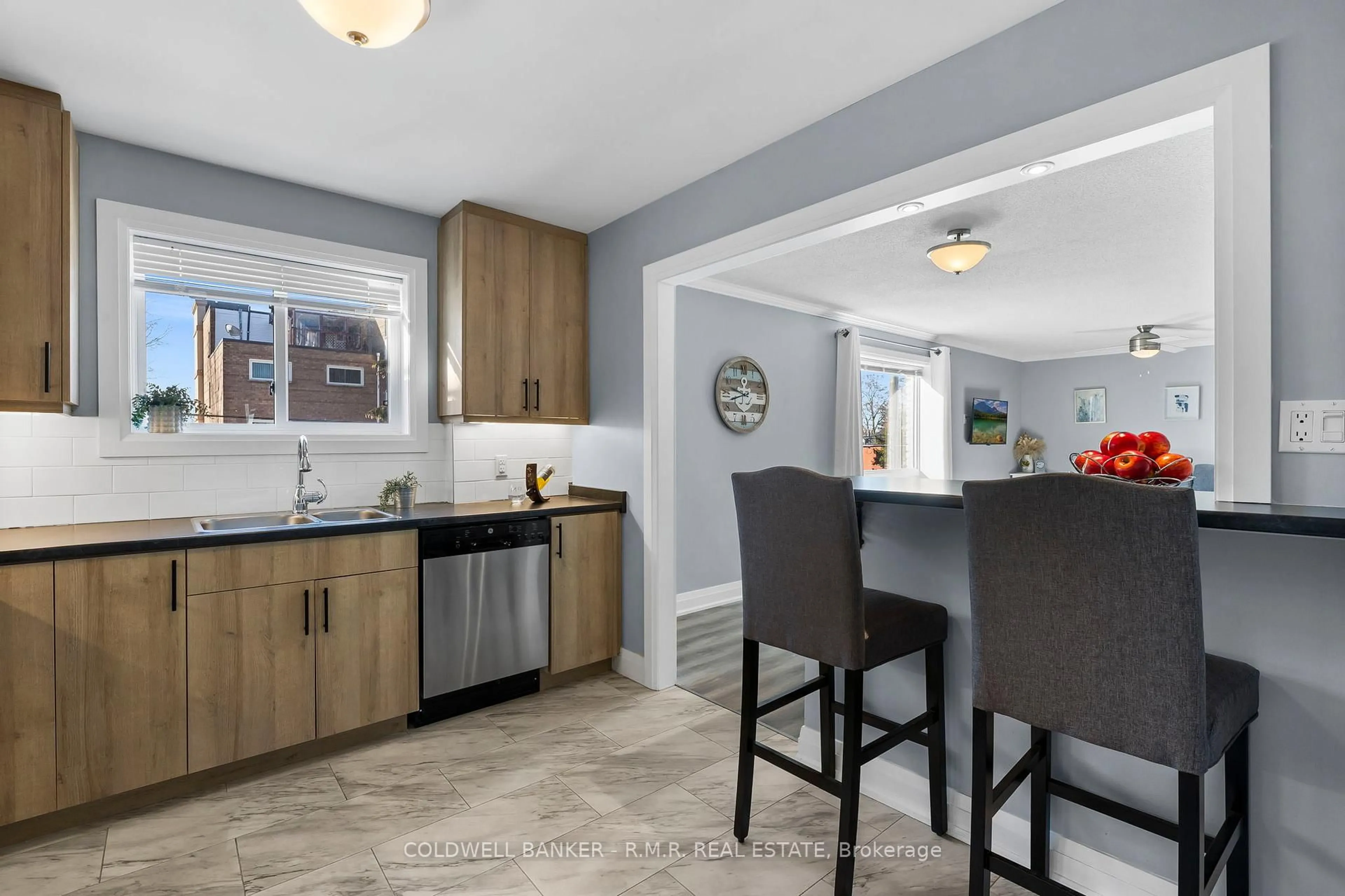 Open concept kitchen, ceramic/tile floor for 26 Spencer St #201, Cobourg Ontario K9A 1C2