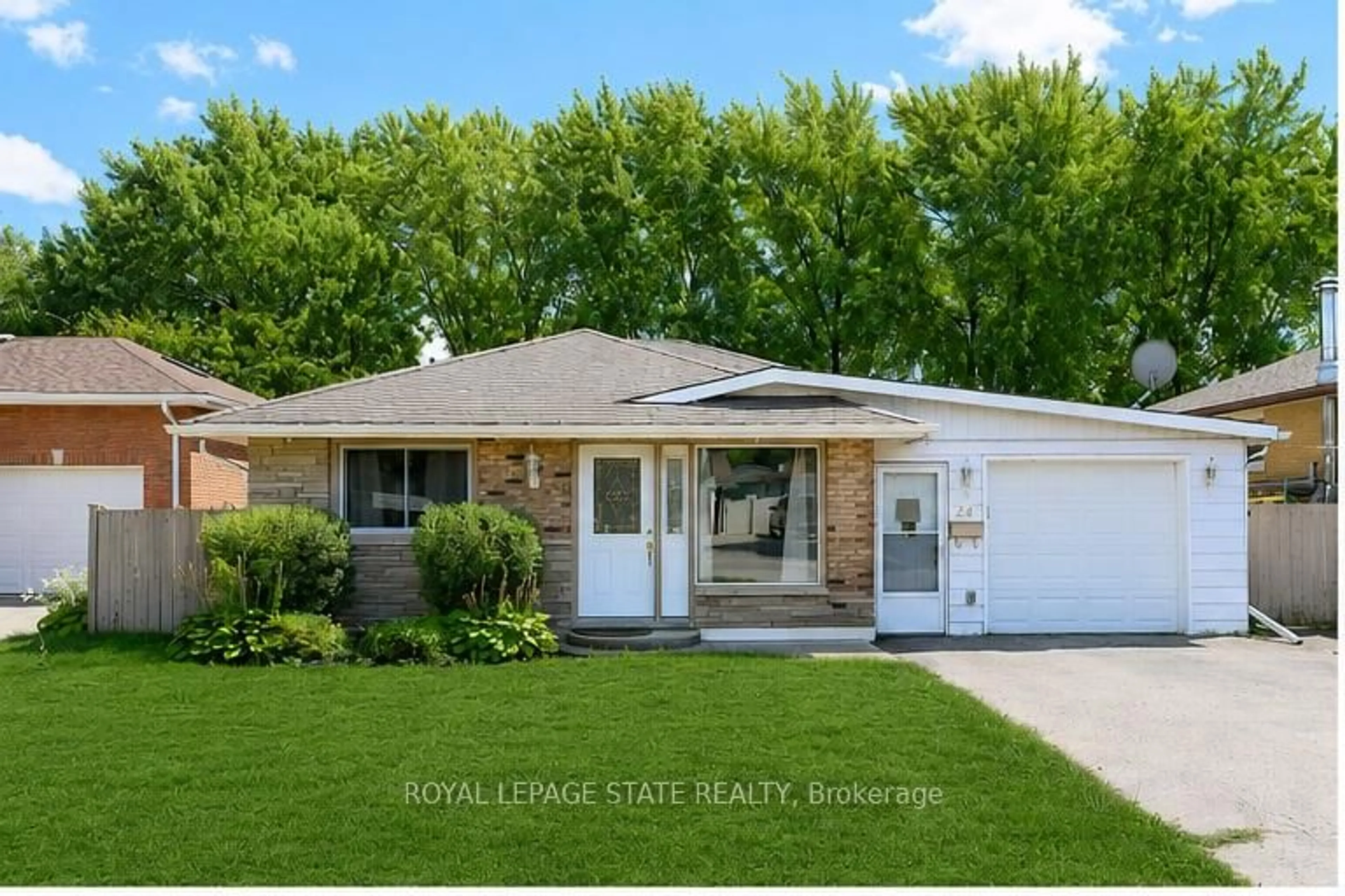 Home with vinyl exterior material, street for 24 Oxford St, Brantford Ontario N3R 5C6