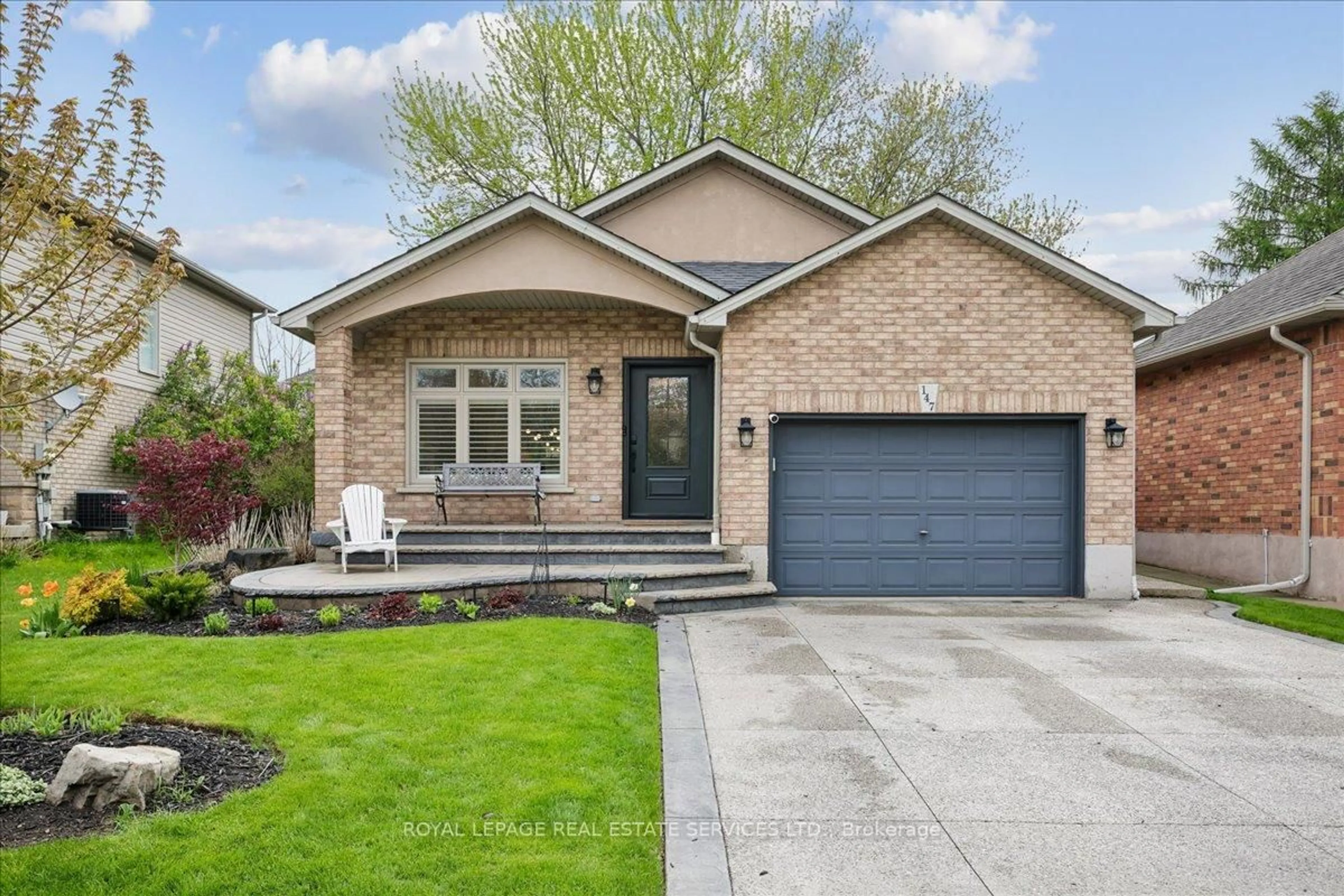 Home with brick exterior material, street for 147 Valridge Dr, Hamilton Ontario L9G 4Y4