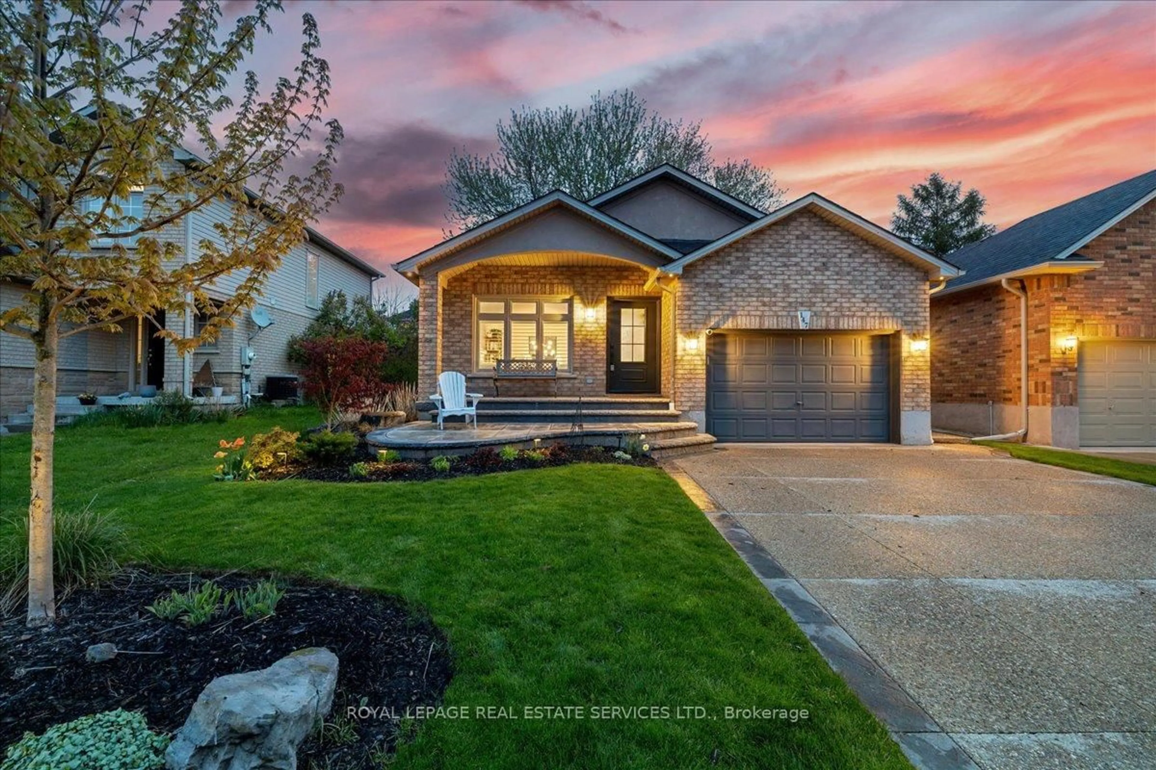 Home with brick exterior material, street for 147 Valridge Dr, Hamilton Ontario L9G 4Y4