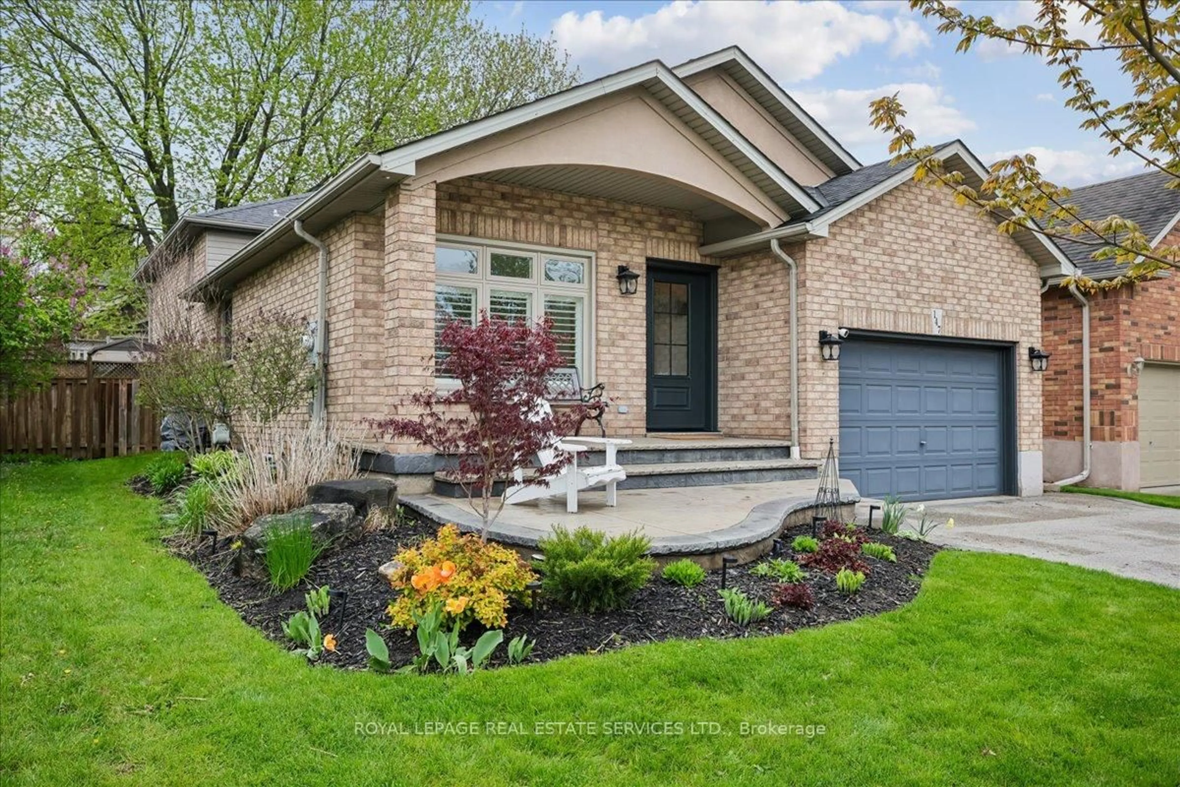Home with brick exterior material, street for 147 Valridge Dr, Hamilton Ontario L9G 4Y4