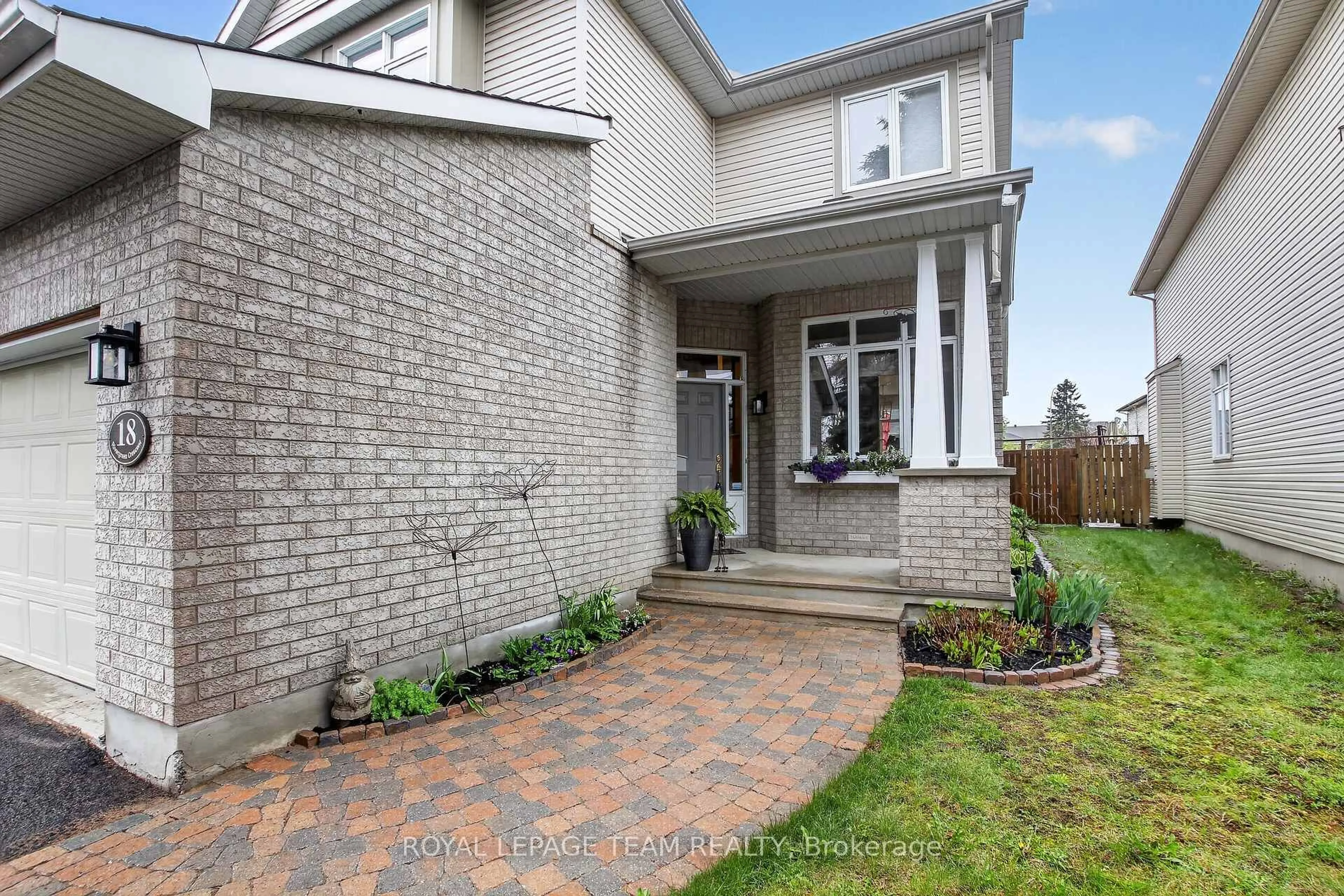 Home with brick exterior material, street for 18 Rivergreen Cres, Ottawa Ontario K2M 2E1